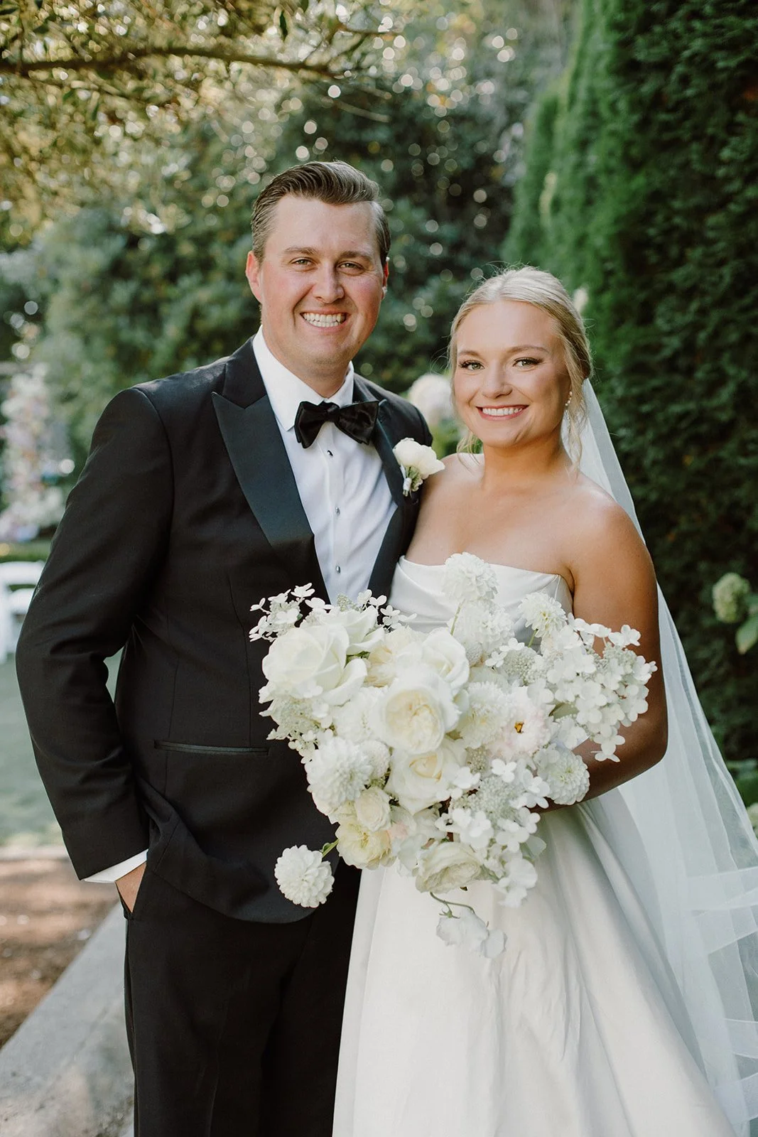 Downtown Seattle Wedding - Bride and Groom with White Whimsical Personal Flowers.jpeg