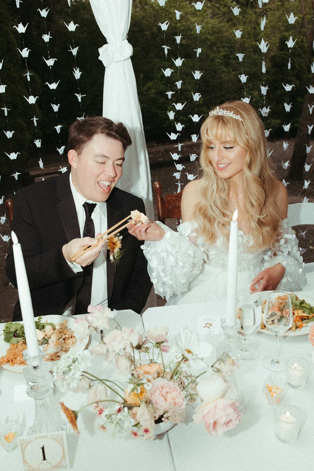 Bride and Groom with Sweetheart Table Floral Centerpiece.JPG