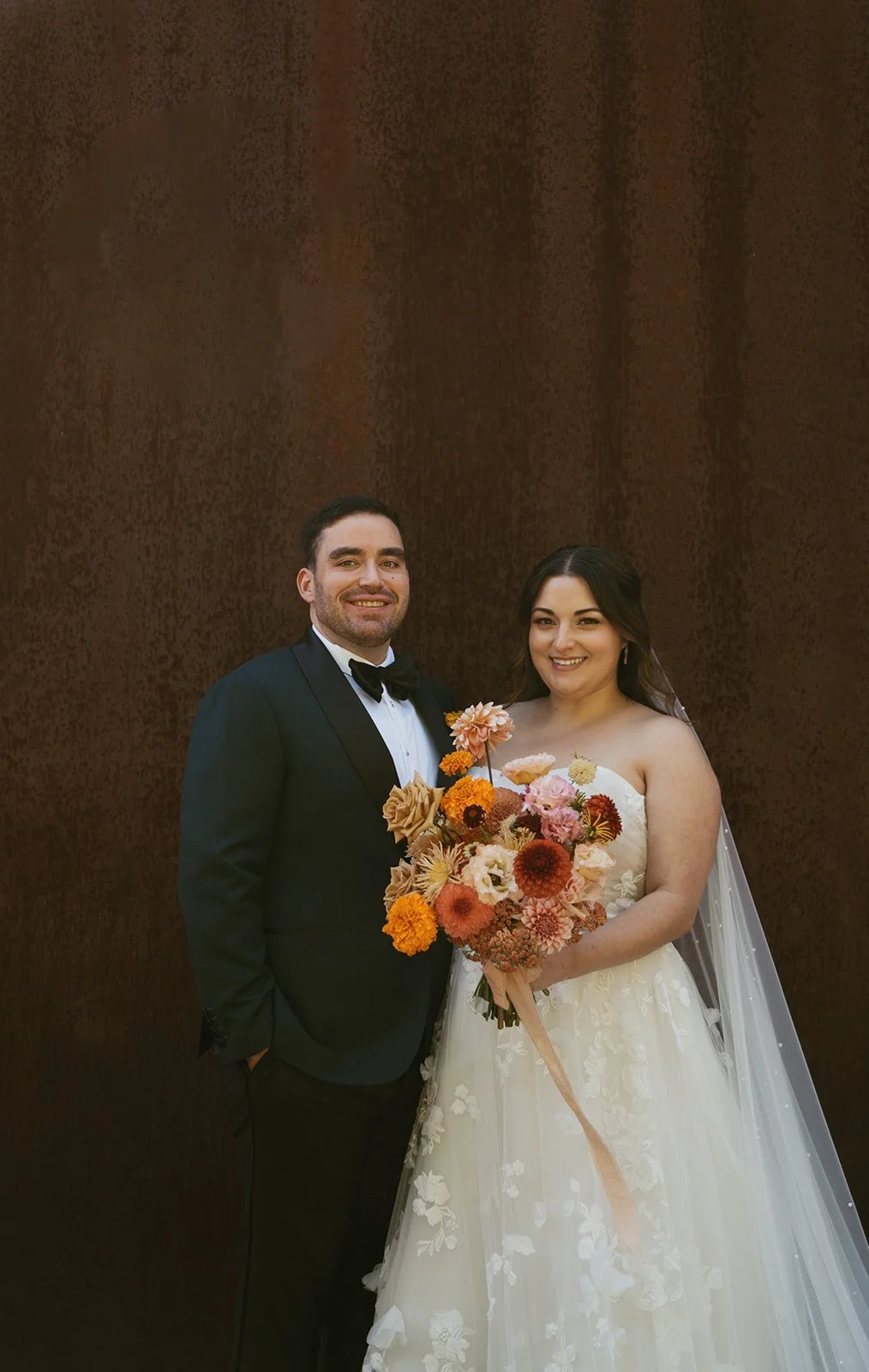 Fall Wedding at Olympic Sculpture Park - Bride and Groom with Whimsical Bouquet.jpg
