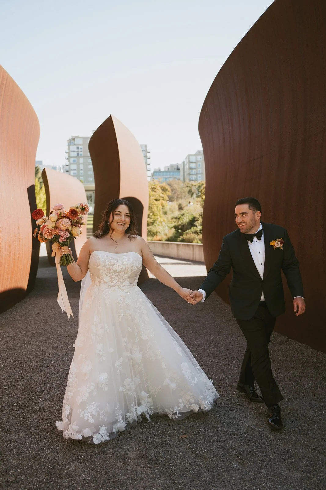 Olympic Sculpture Park Wedding - Bride and Groom with Whimsical Floral Bouquet.jpg