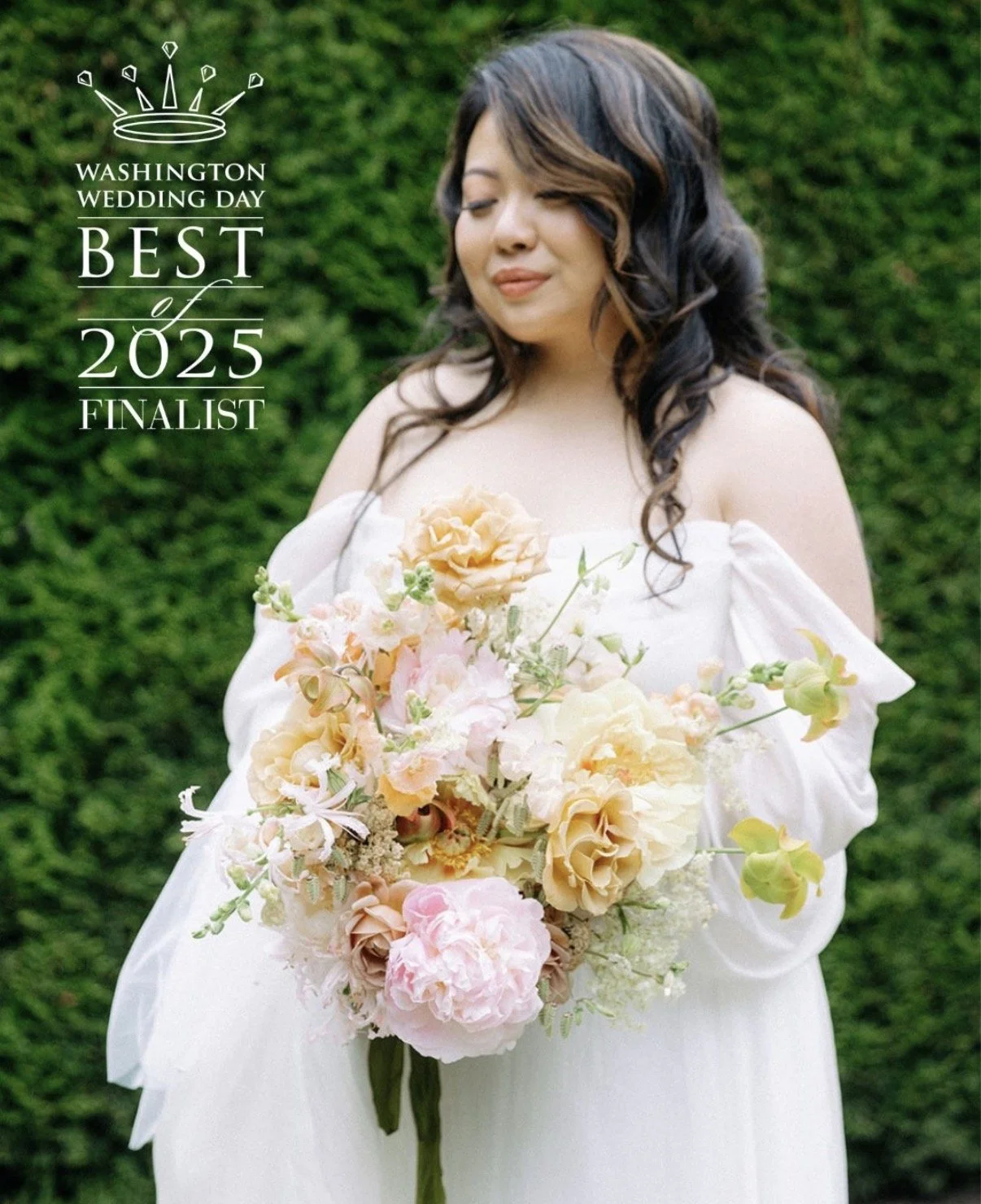 Photo of a bride in a soft white dress holding a bouquet of peonies and roses designed by New Leaf Floral Design a 2025 Washington Wedding Day Finalist