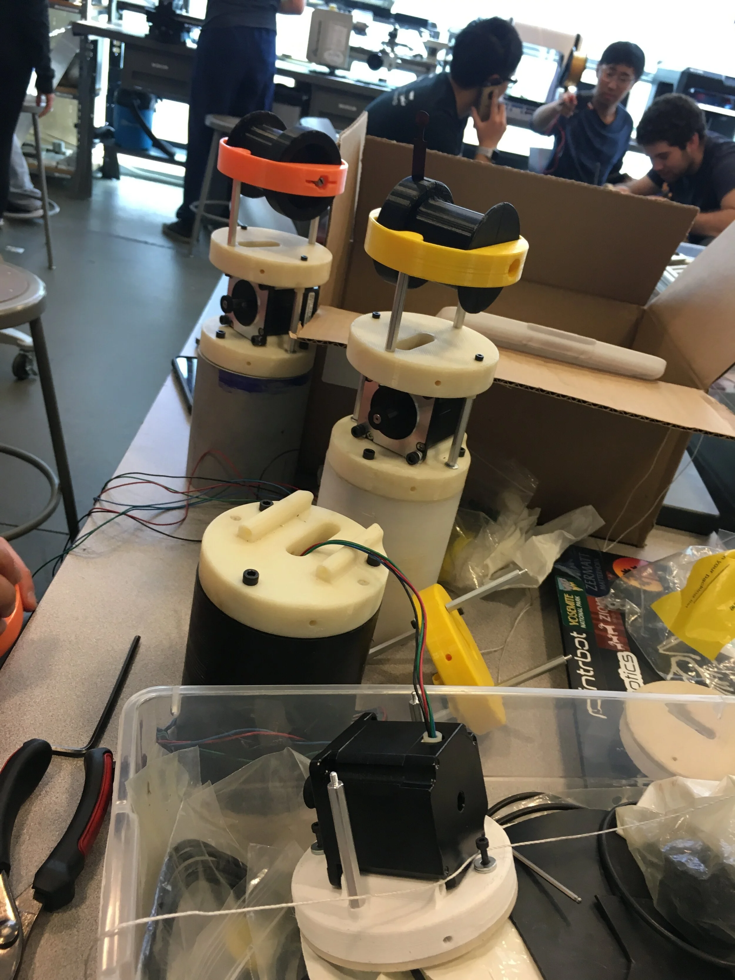  Putting together the spool and motor assemblies on the Delrin blocks, 3D printed mounts, and hex standoffs. 