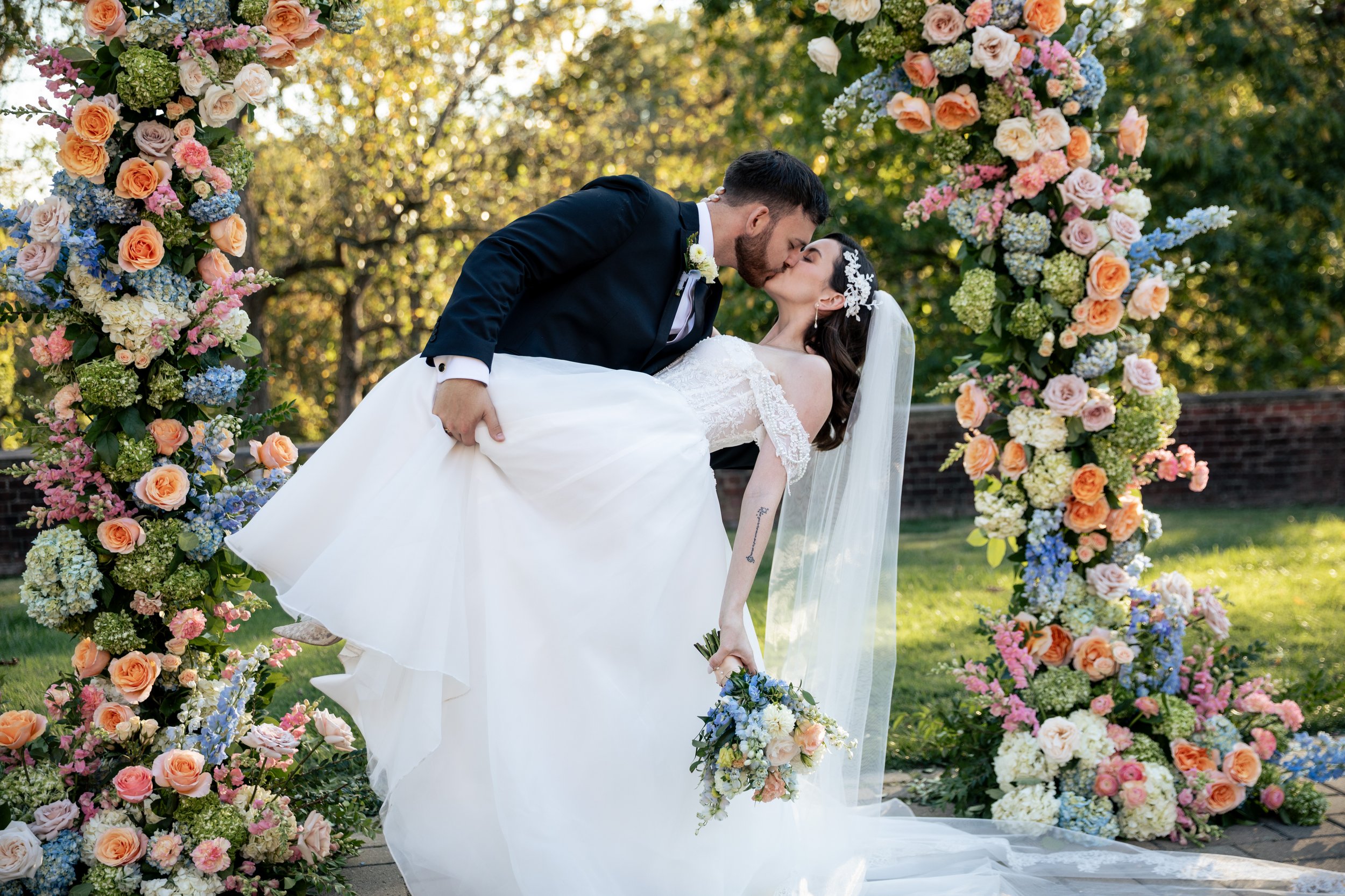 Groom dipping bride at the alter