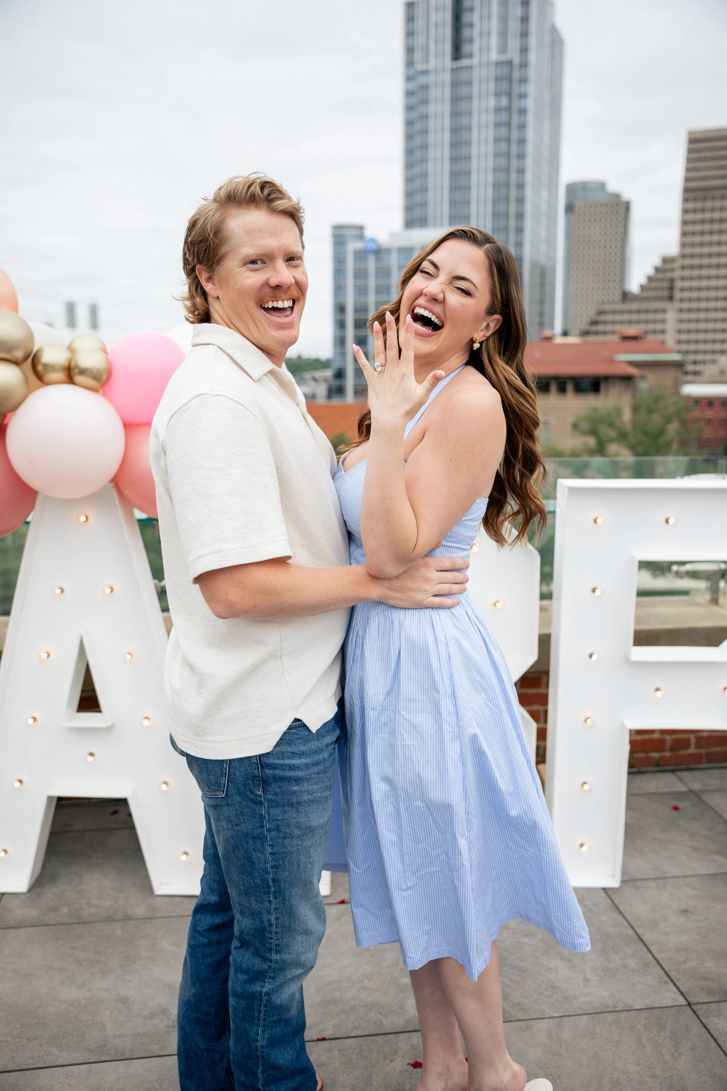 Cincinnati Reds pitcher Andrew Abbott proposing to his girlfriend, news anchor Lindsay Stone