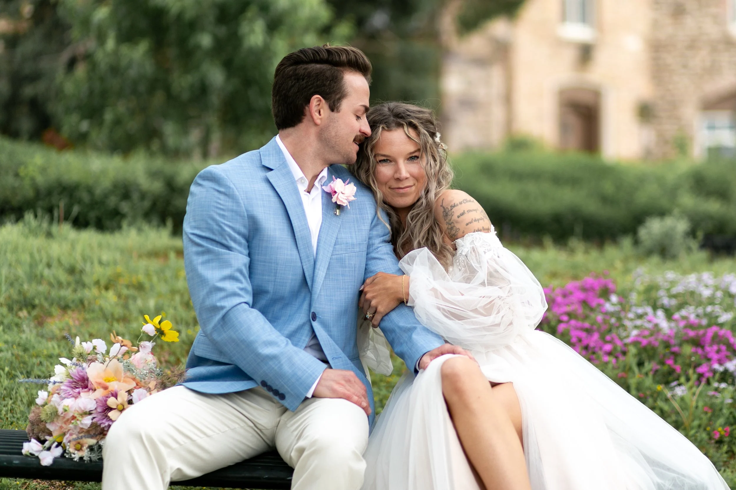 Bride and groom sitting
