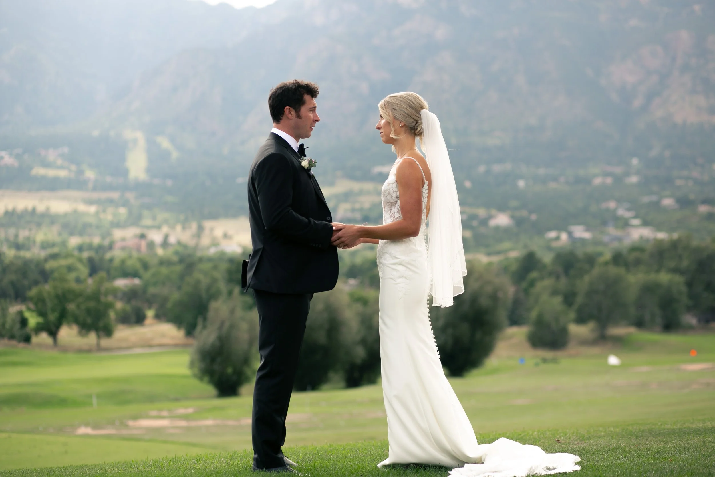 bride and groom exchanging vows