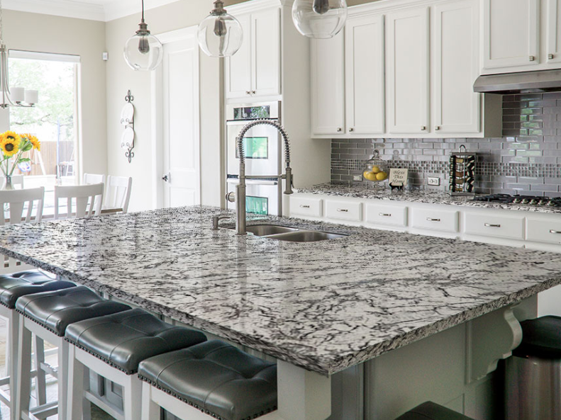 How a Granite Cost Calculator Explains Large-Format Countertop Prices?