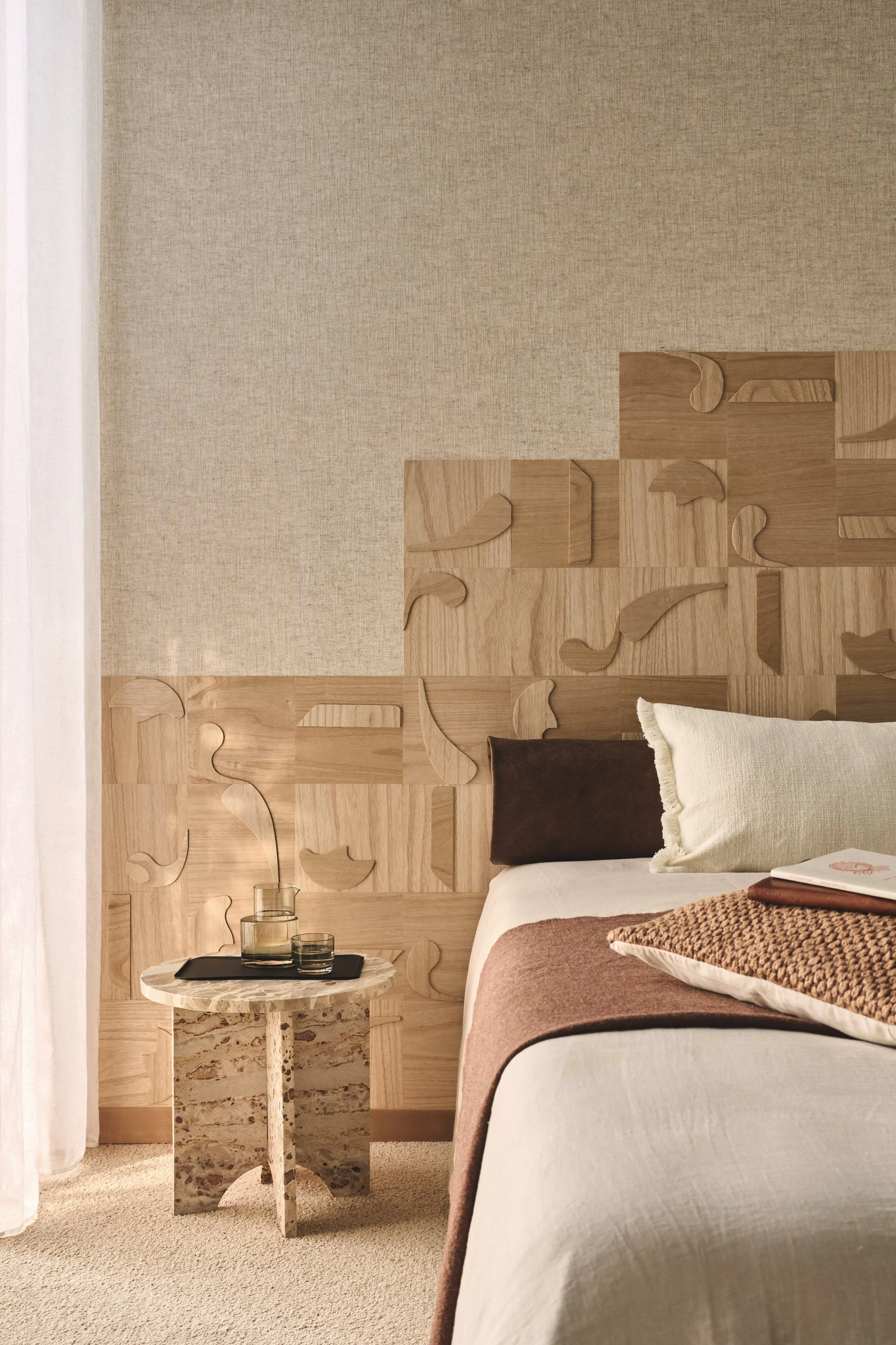 Omexco Kim Mupangilaï Oba KIM43 sculptural wood wallcovering with organic forms in carved relief.