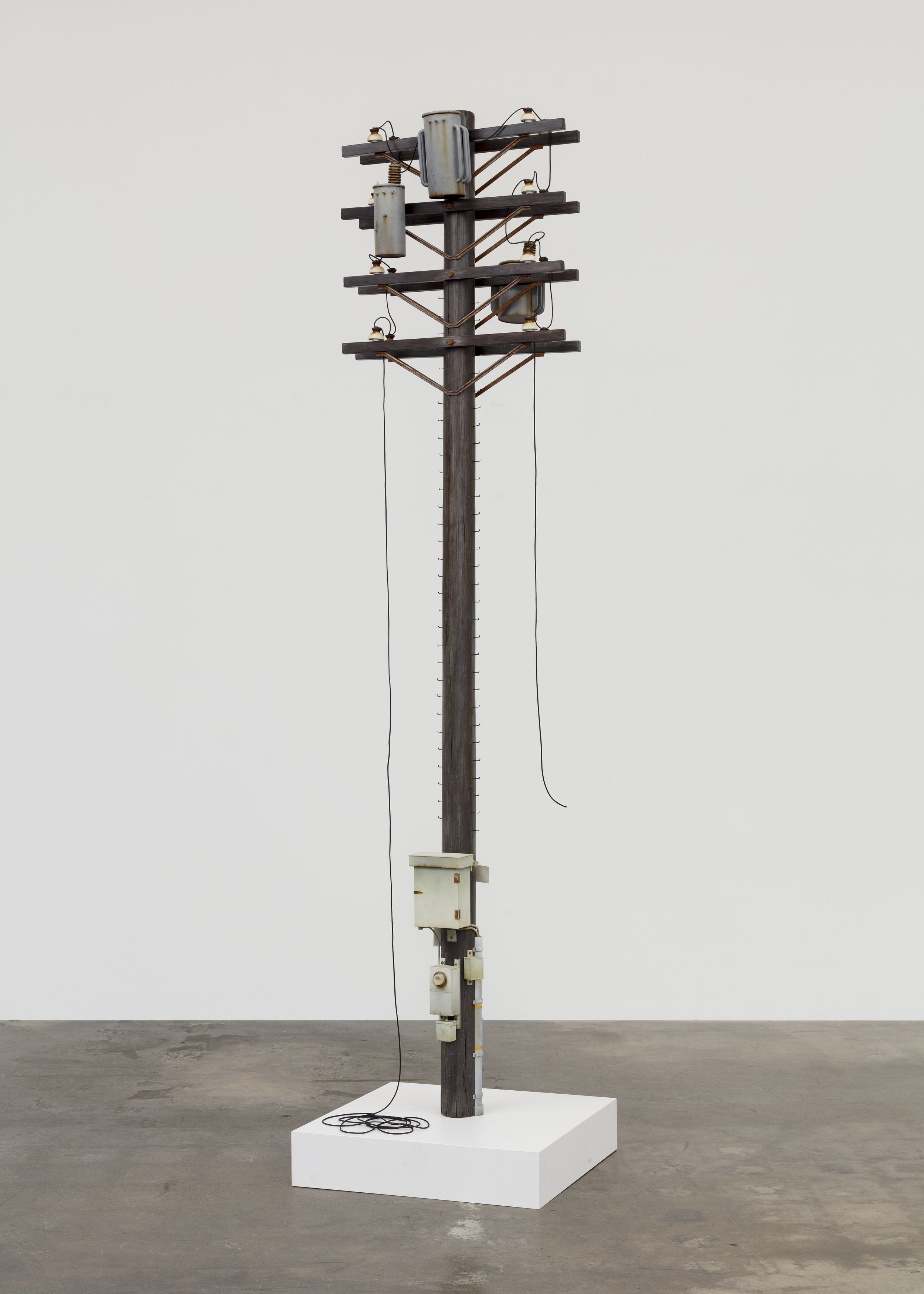   Totem 3 , 2023. Bondo, acrylic and solvent based paints on wood, paper, steel, nylon shoelace, PVC, and vinyl. 96 x 23 x 10 inches 