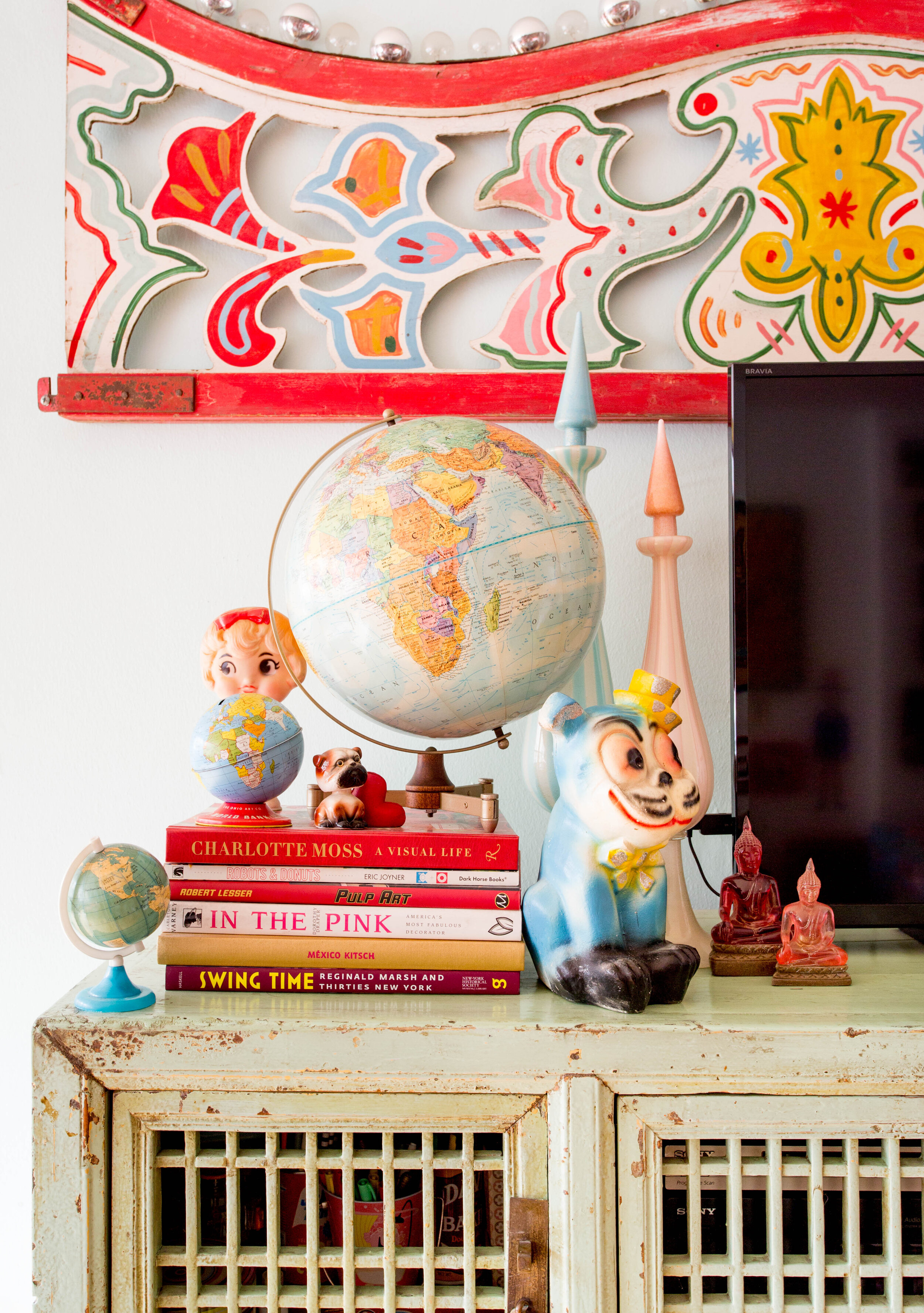 globe and carnival chalkware display.jpeg
