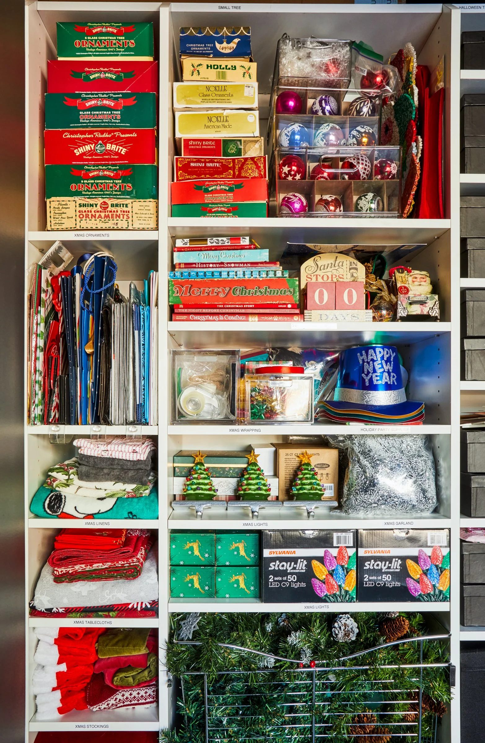storage closet organization of holiday decorations