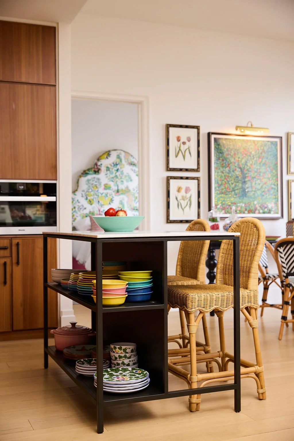 fiestaware has pride of place with open shelving under kitchen island