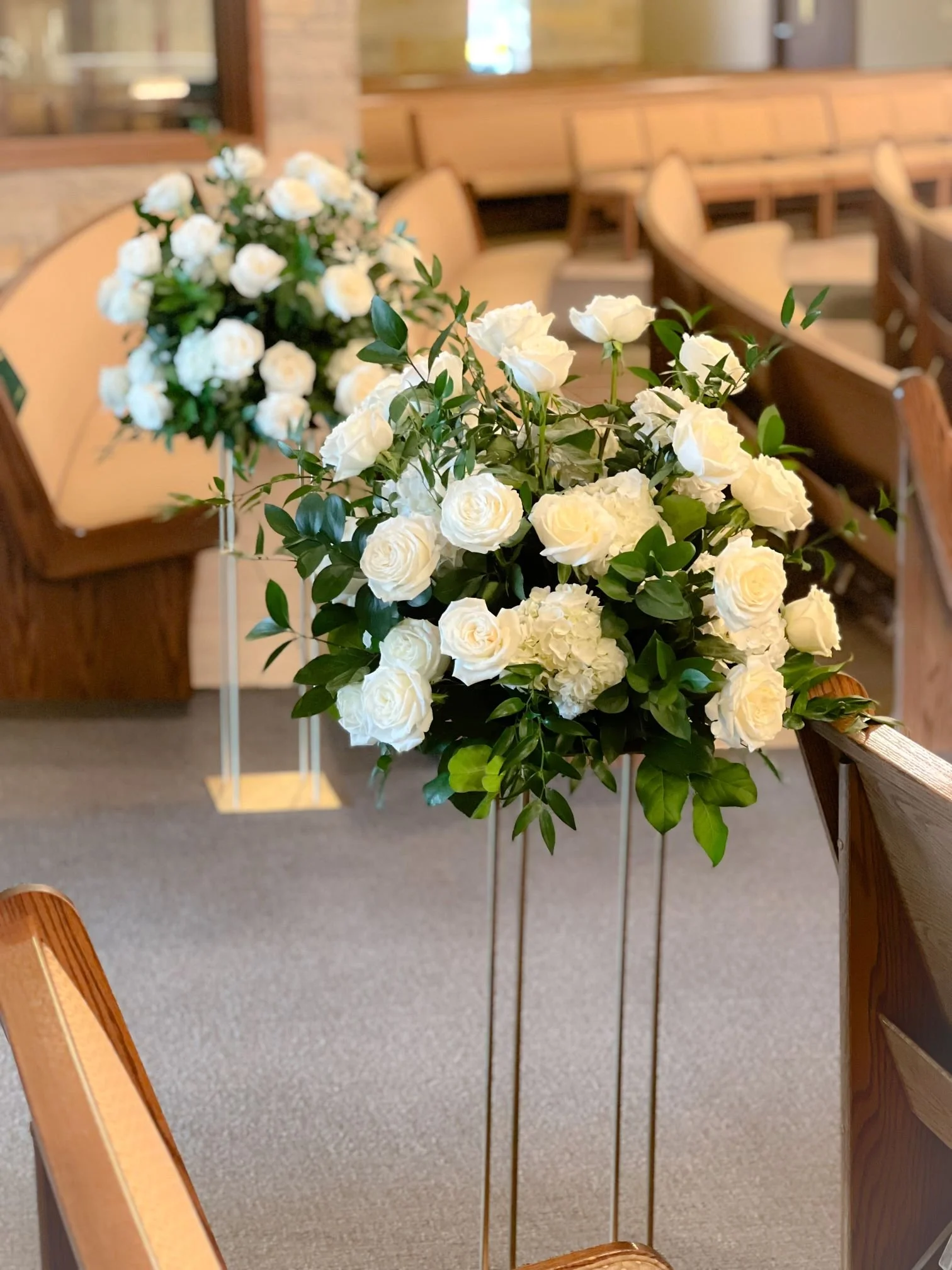 Gold Stand aisle white floral.jpg