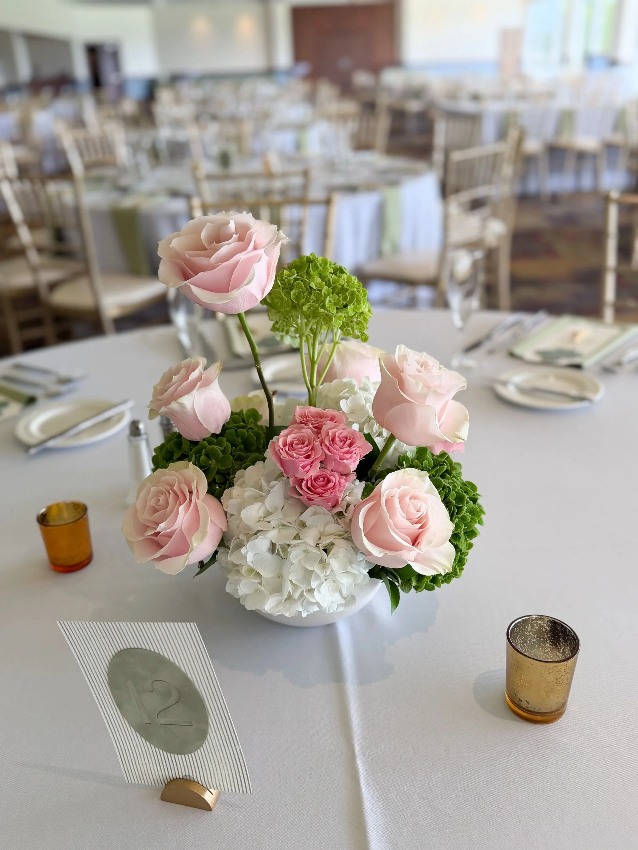 Pink and white asymmetrical centerpiece.jpg