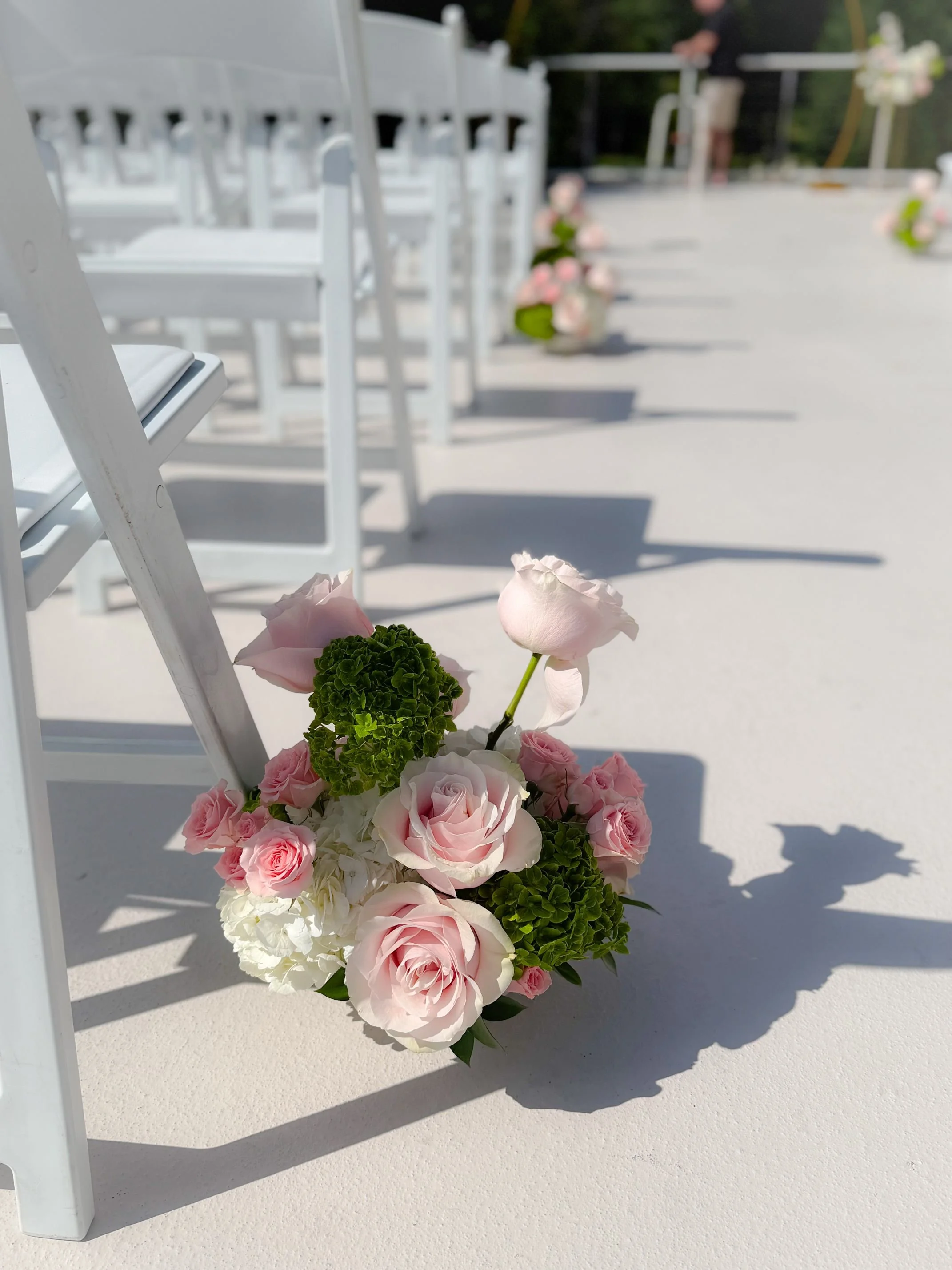 Pink and white asymmetrical aisle marker.jpg