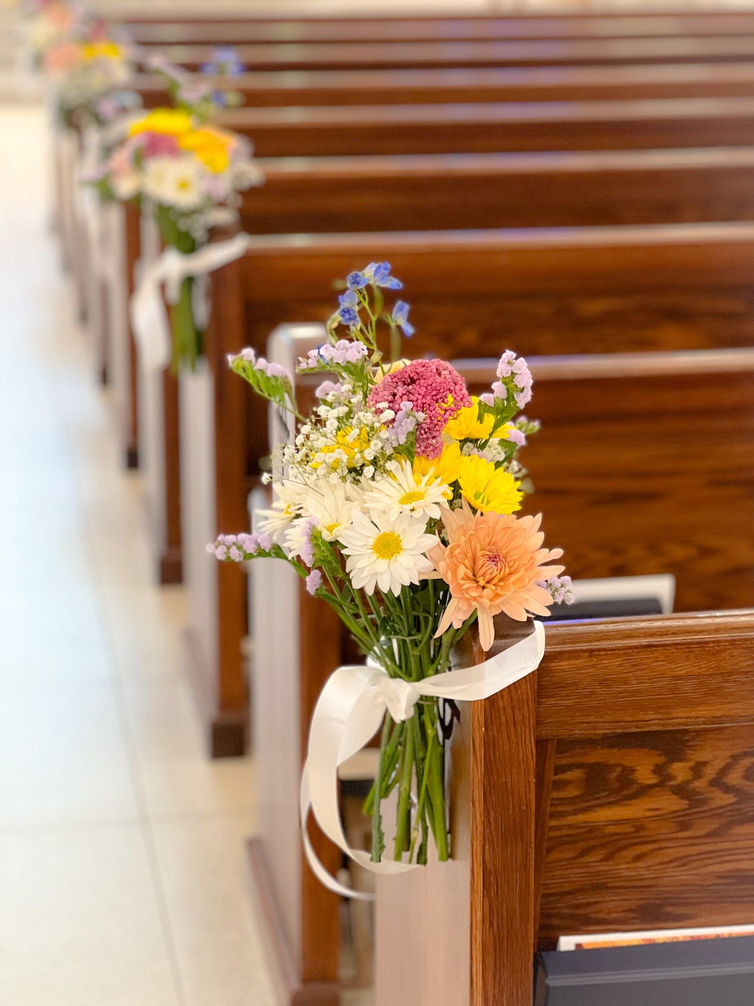 Wildflower pew bouquets.jpg