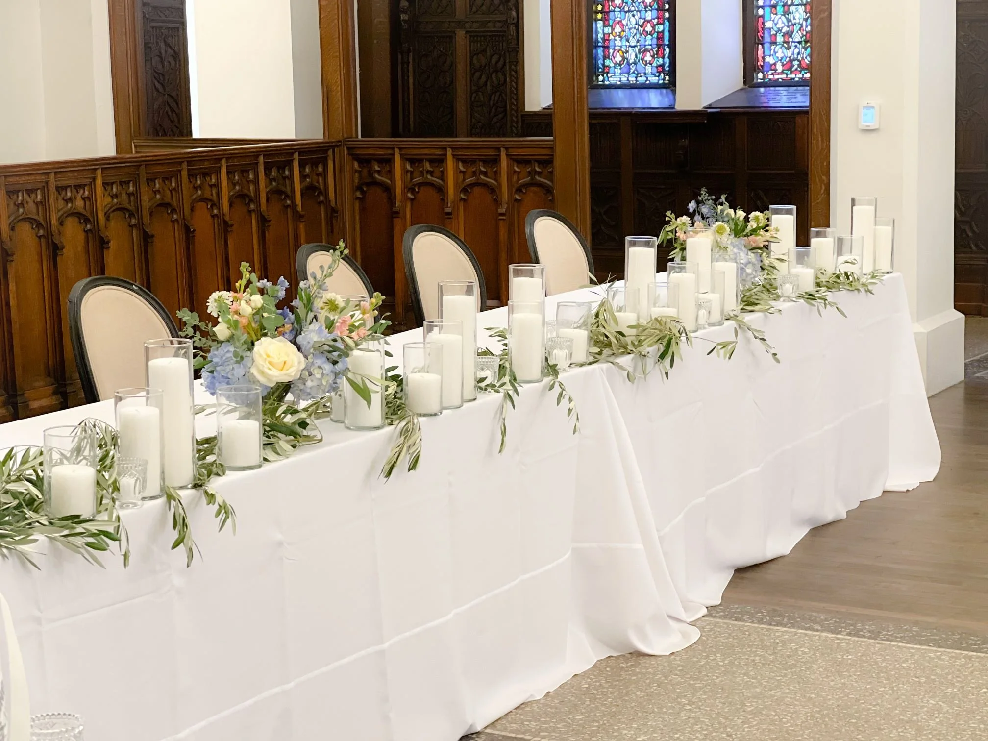 St james head table olive centerpieces candles.jpg