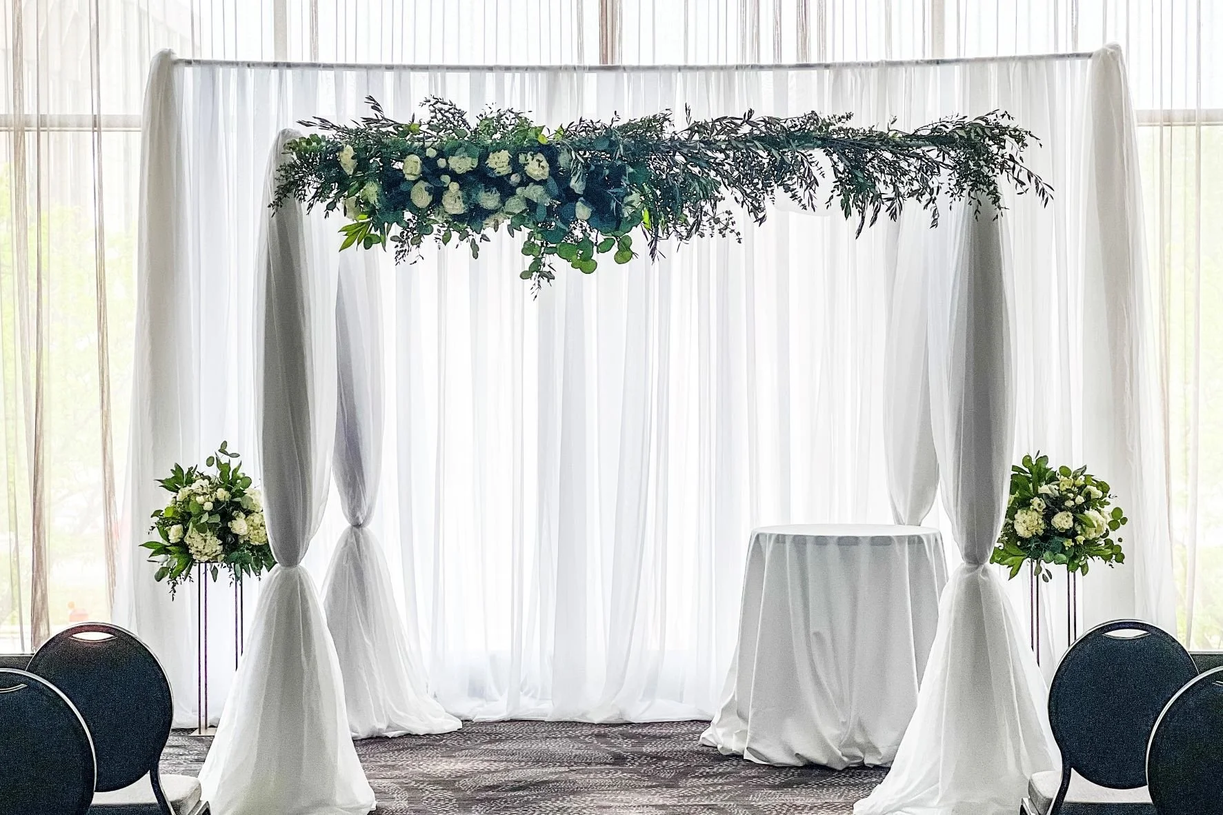 Chuppah greenery white roses.jpg