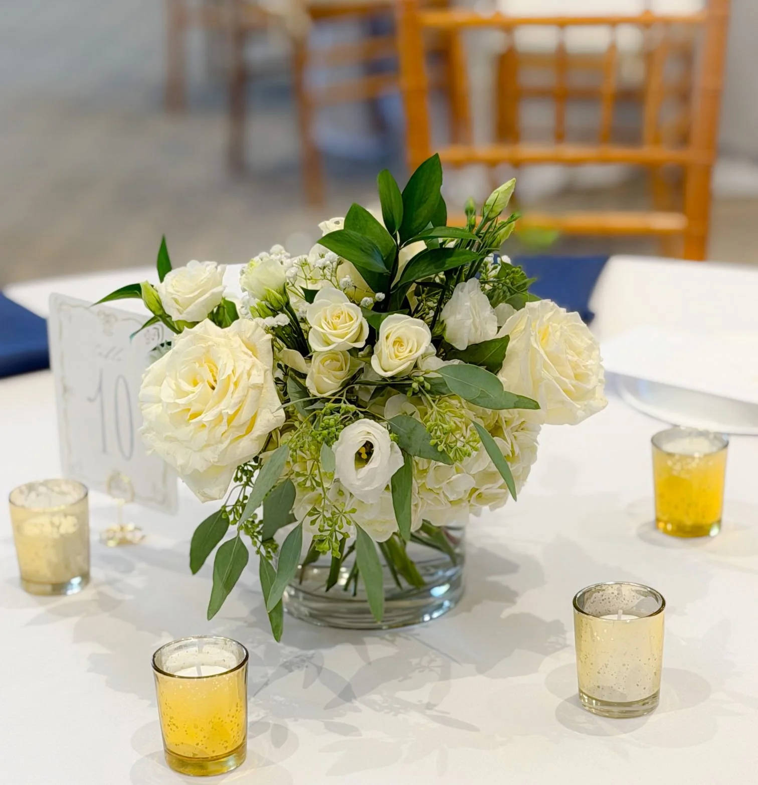 Aspen lisi seeded euc cylinder centerpiece.jpg
