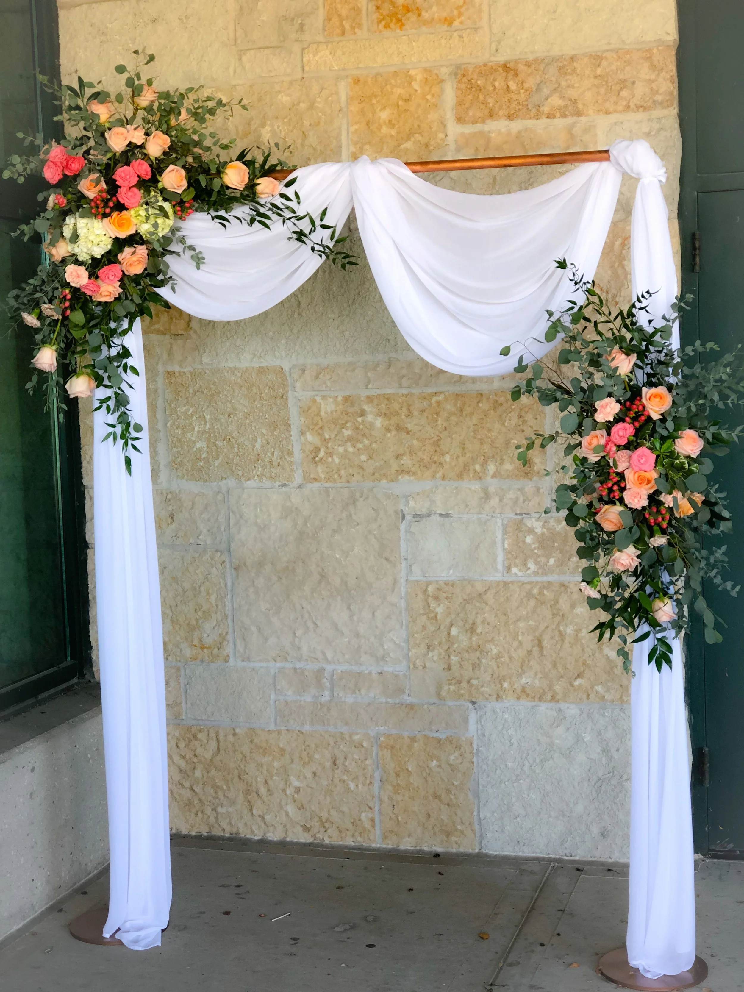 Copper arch peach flowers.JPEG