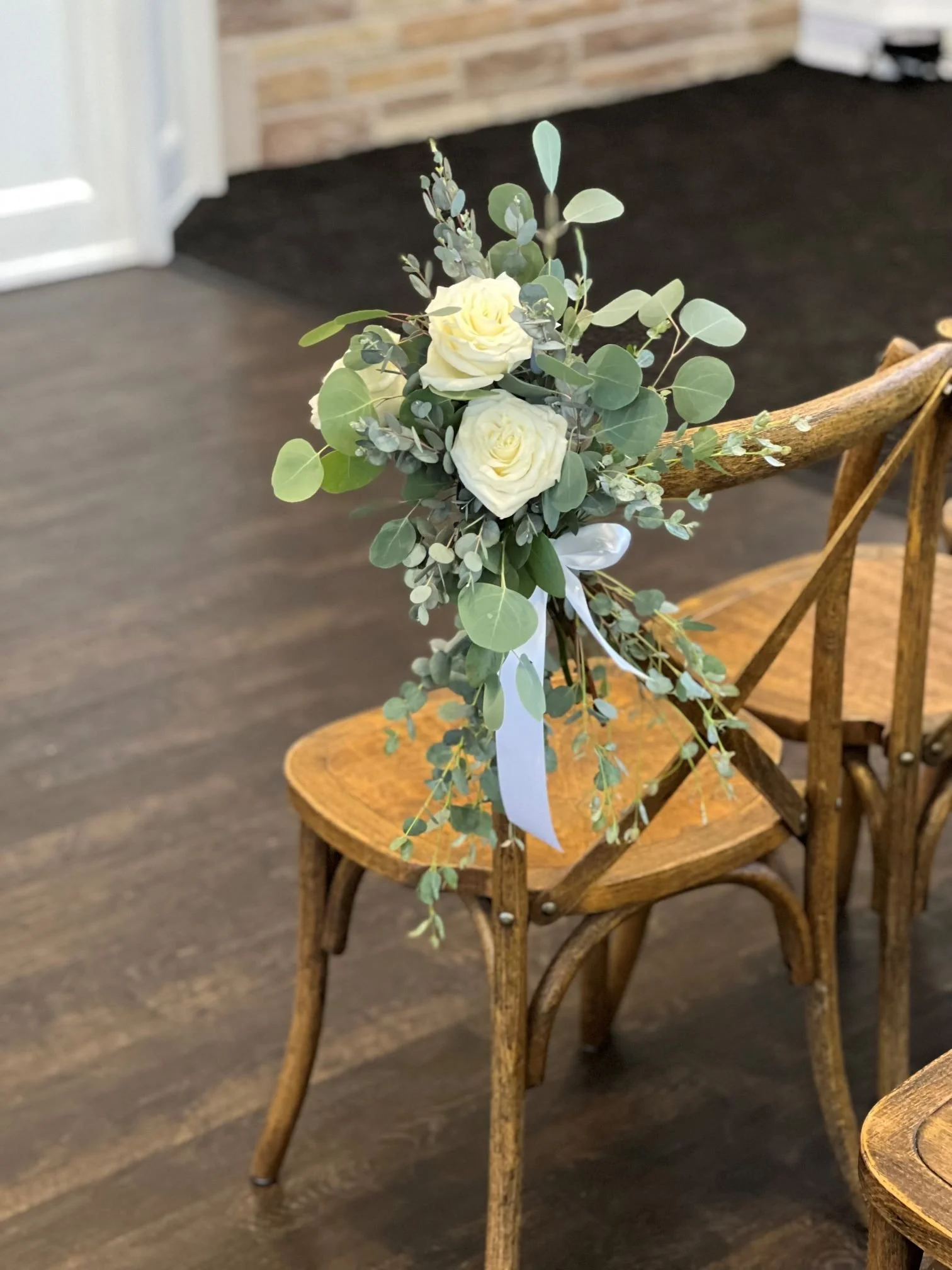 Chair bouquet white roses euc.jpg