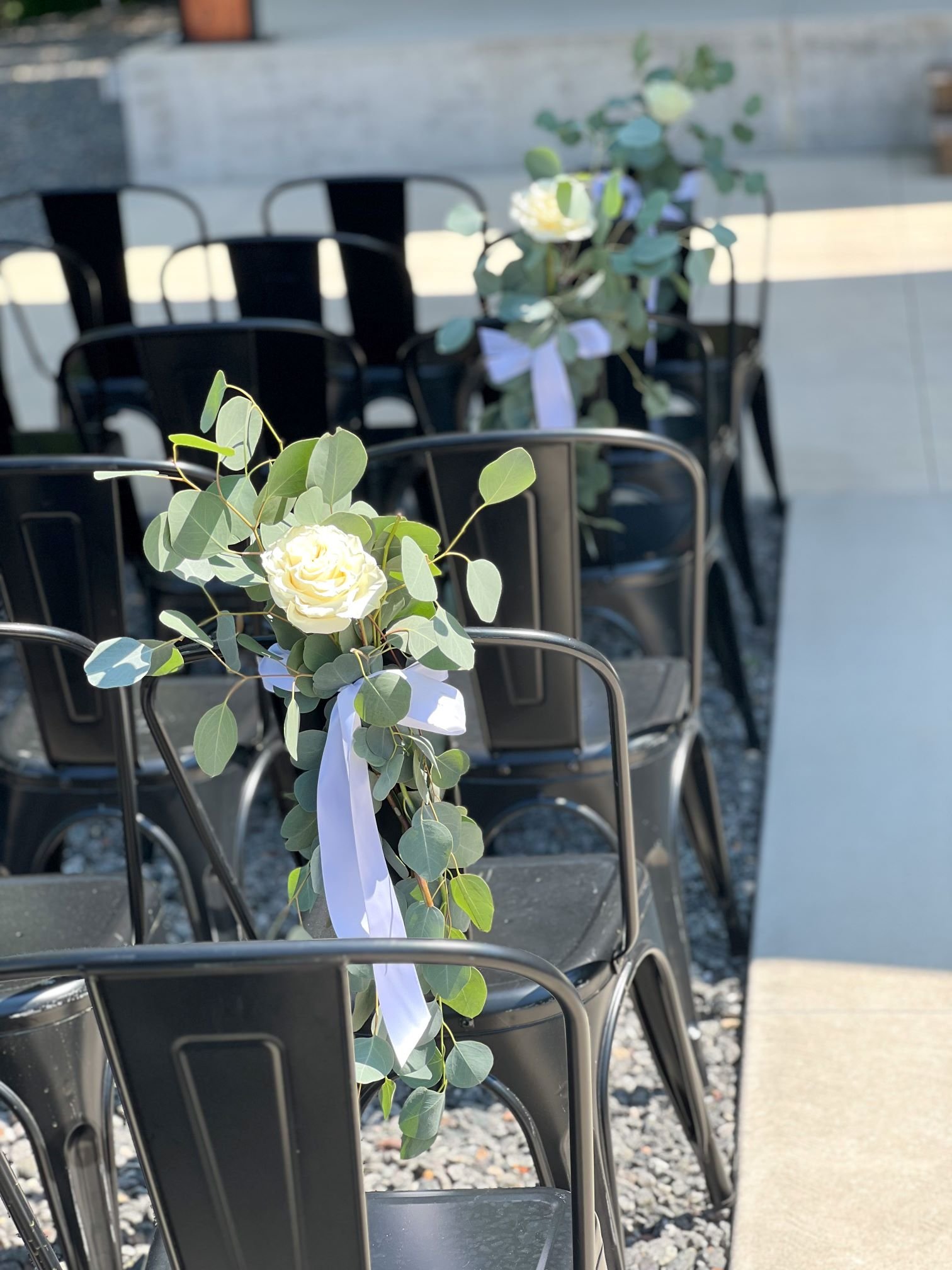 Foundry rose euc chair bouquets.jpg