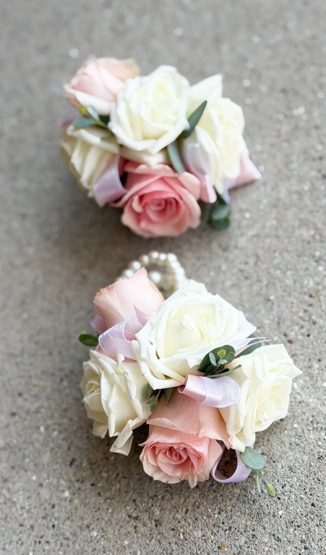 Pink white ranunculus wrists.jpg