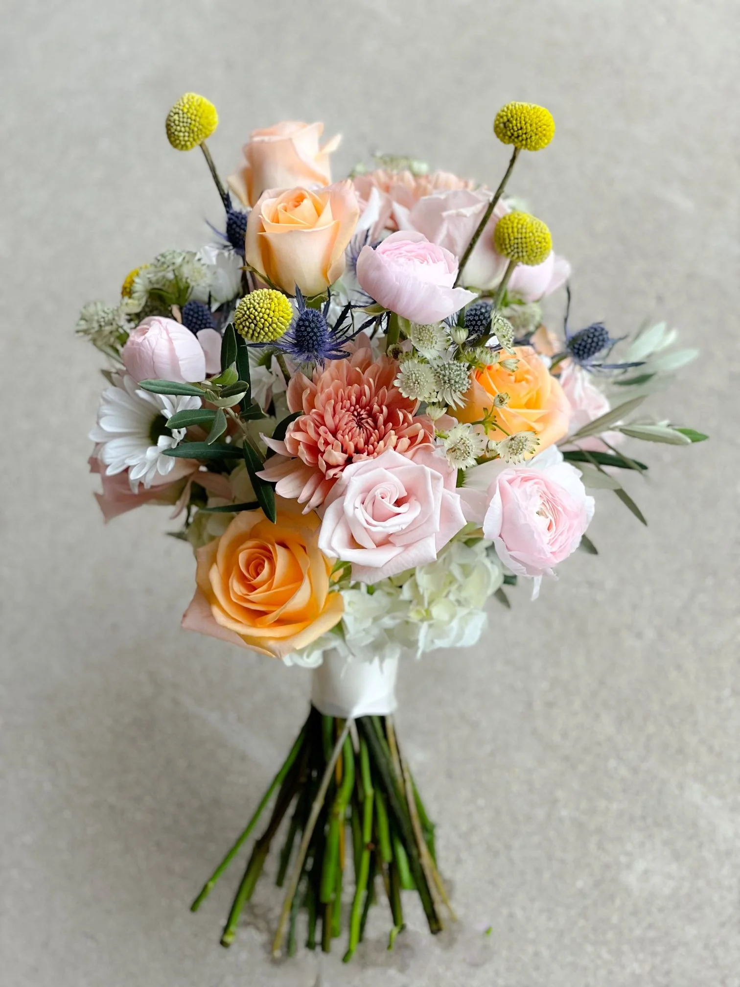 Peach white blue craspedia bridal.jpg