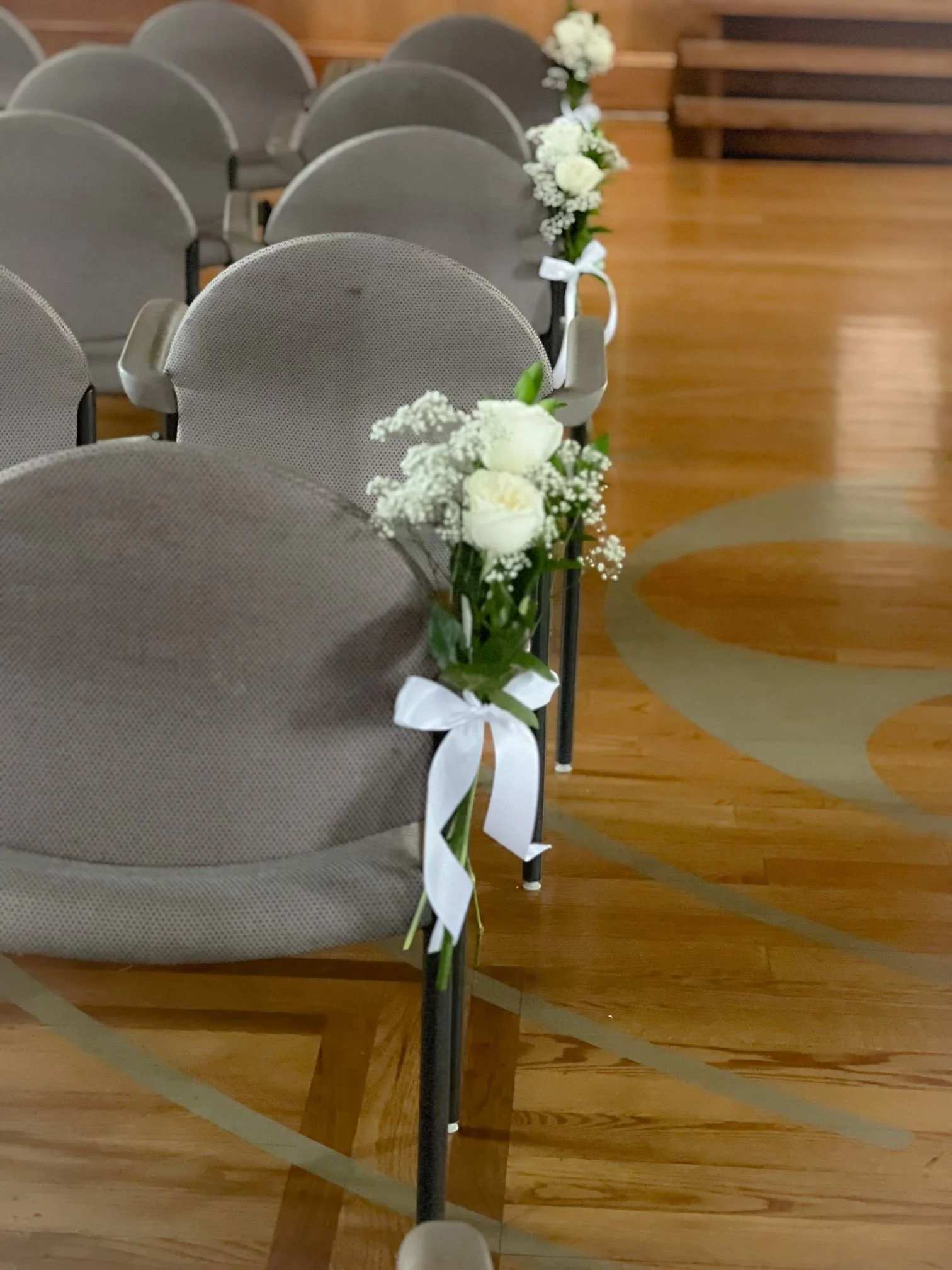 two rose gyp chair bouquets.jpg