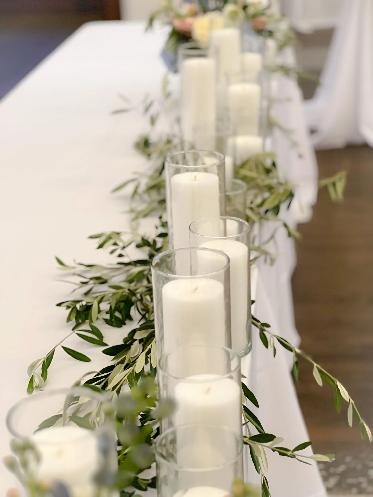 Olive branches candle head table.jpg