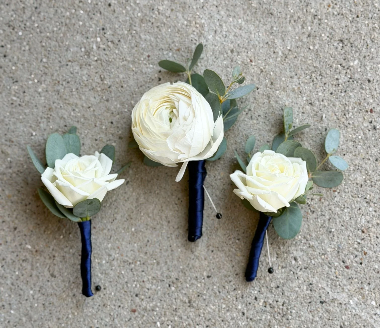 White ranunculus spray rose bouts.jpg