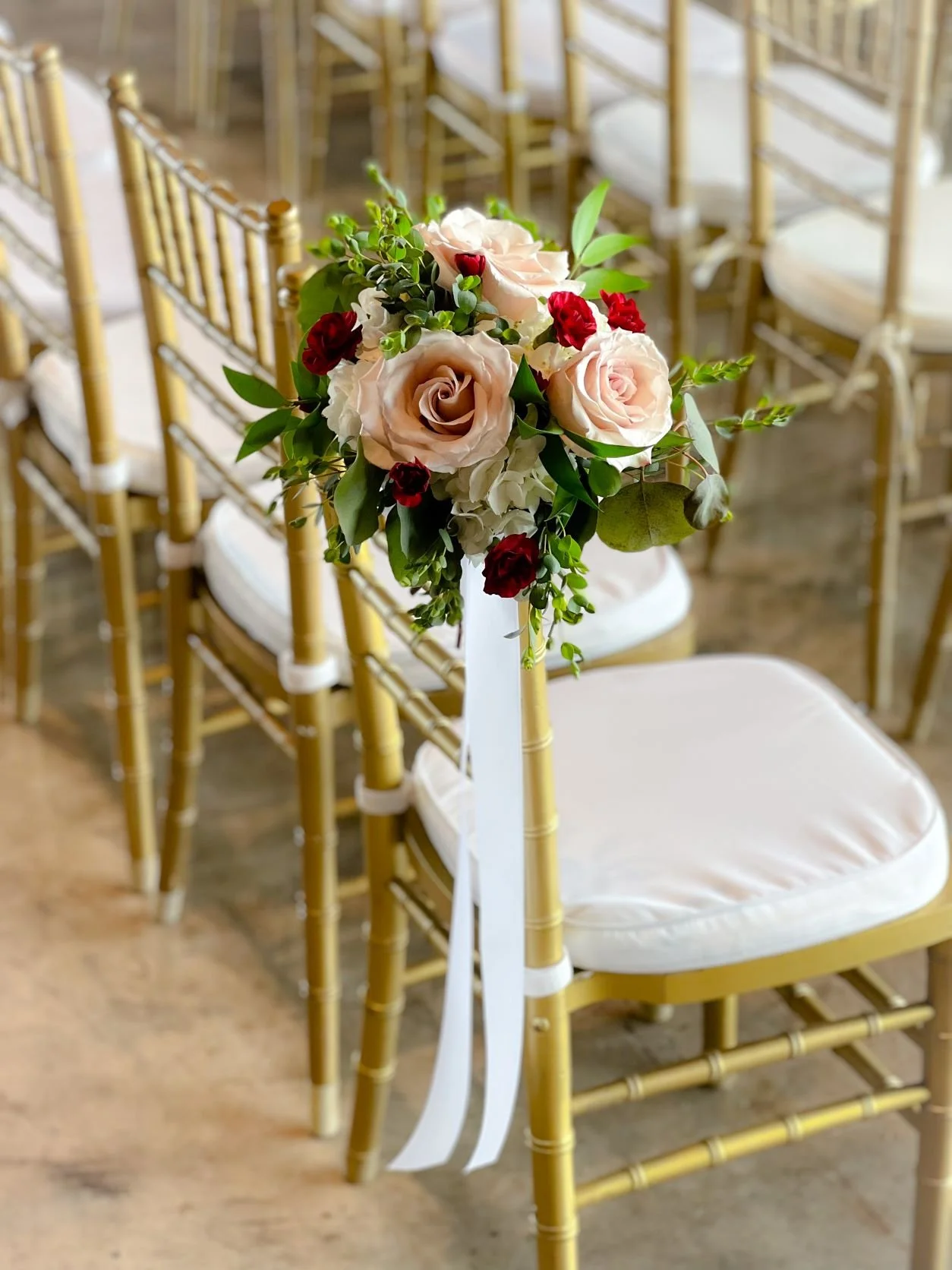 Sahara burgundy chair bouquet.JPEG