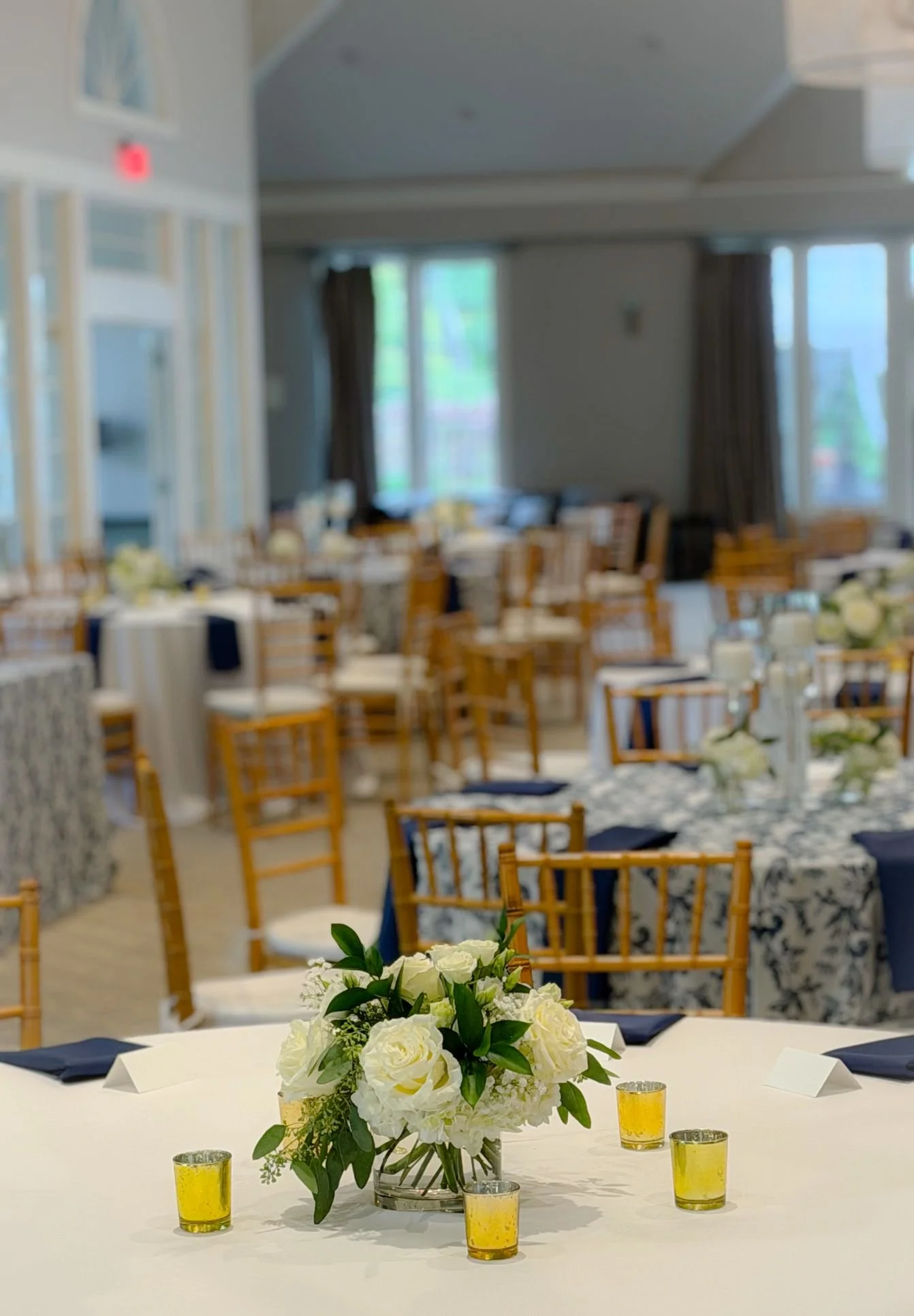 Shullys reception navy floral linens.jpg