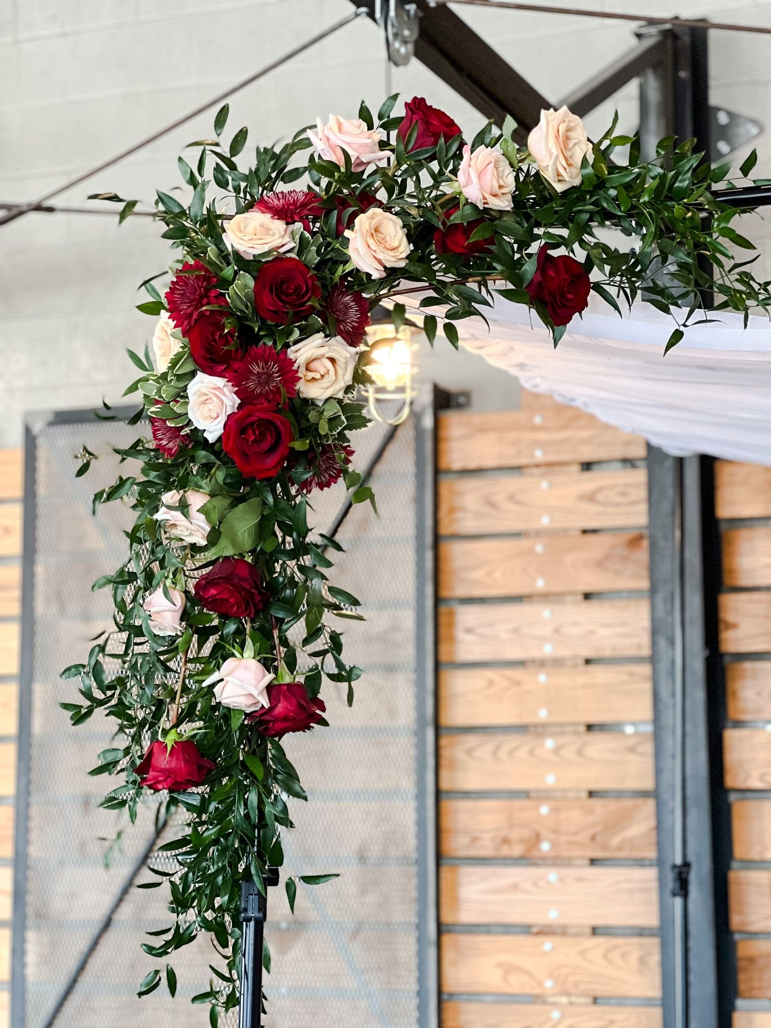 Burgundy cream chuppah corner.jpg