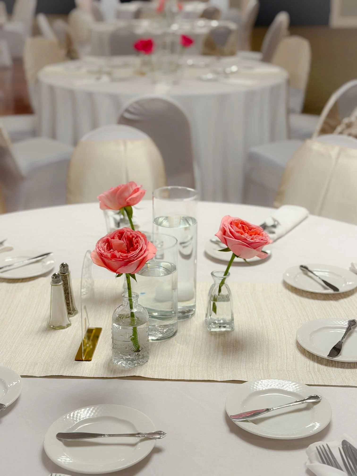 Pink bud vase Florian table.jpg