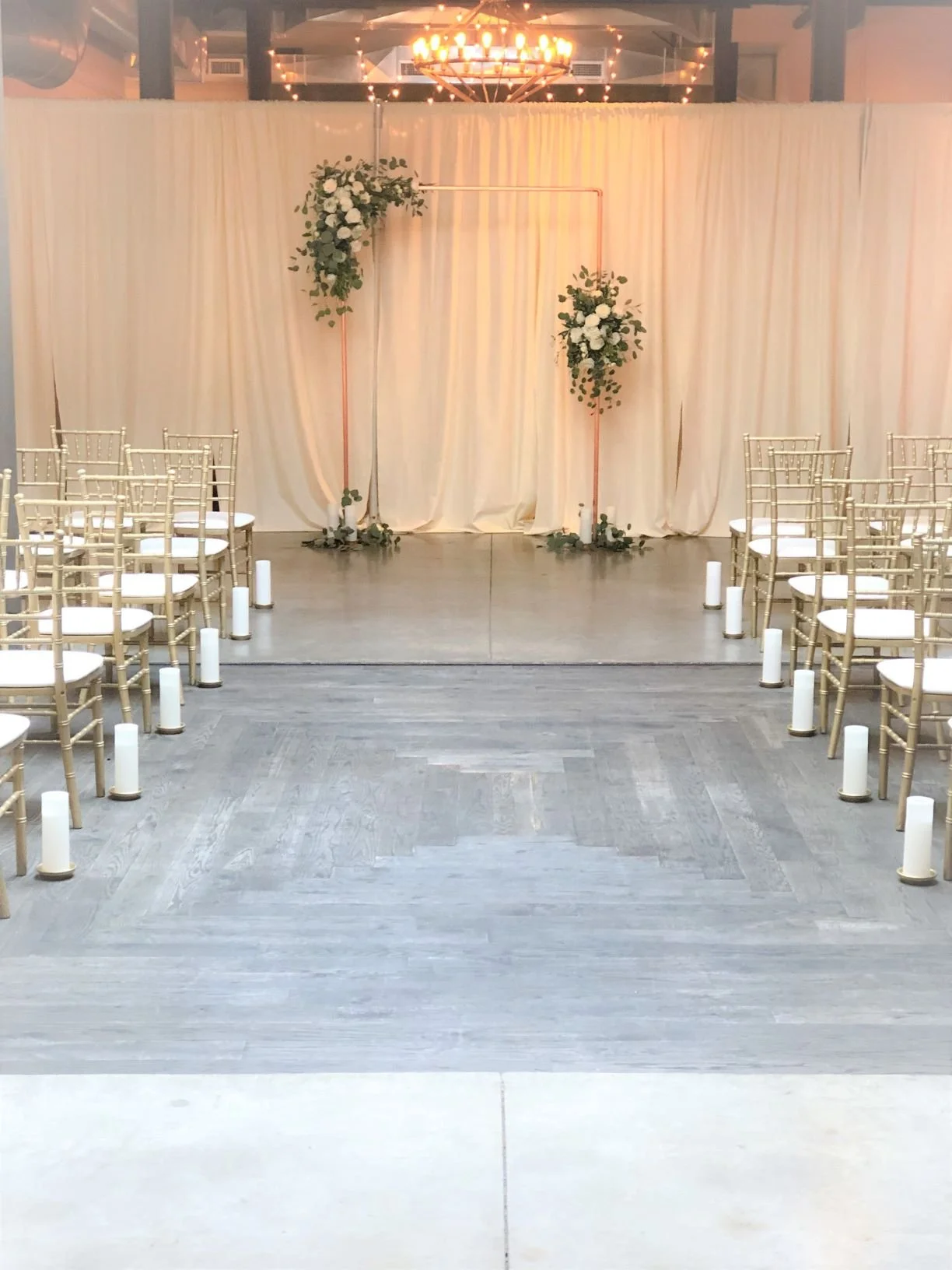 Copper arch aisle candles Atrium Sm.JPEG