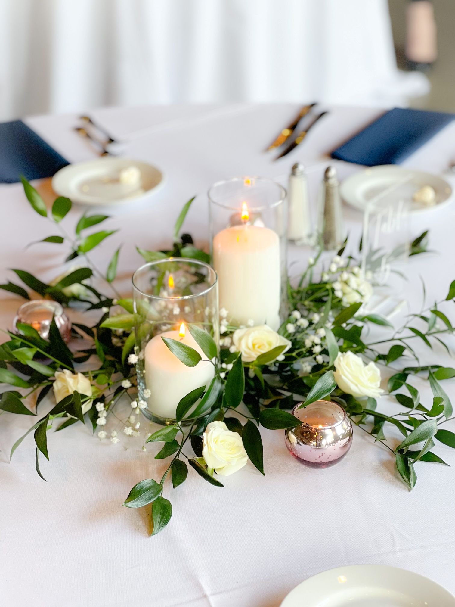 Candle ruscus snowflake gyp table.jpg
