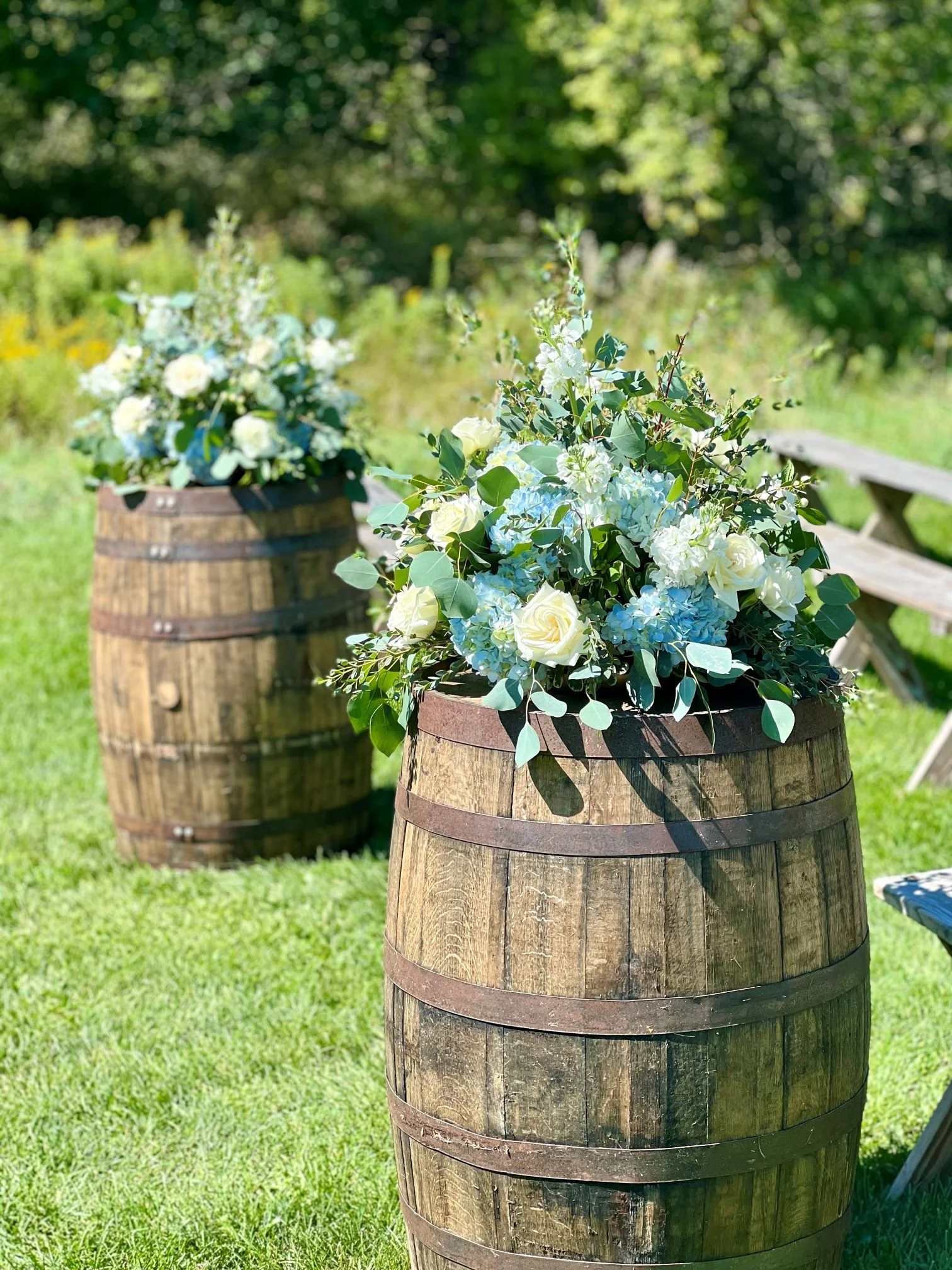 Whiskey barrels blues and whites.jpg