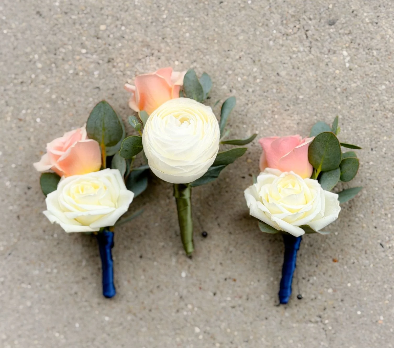 Peach white ranunculus spray rose bouts.jpg