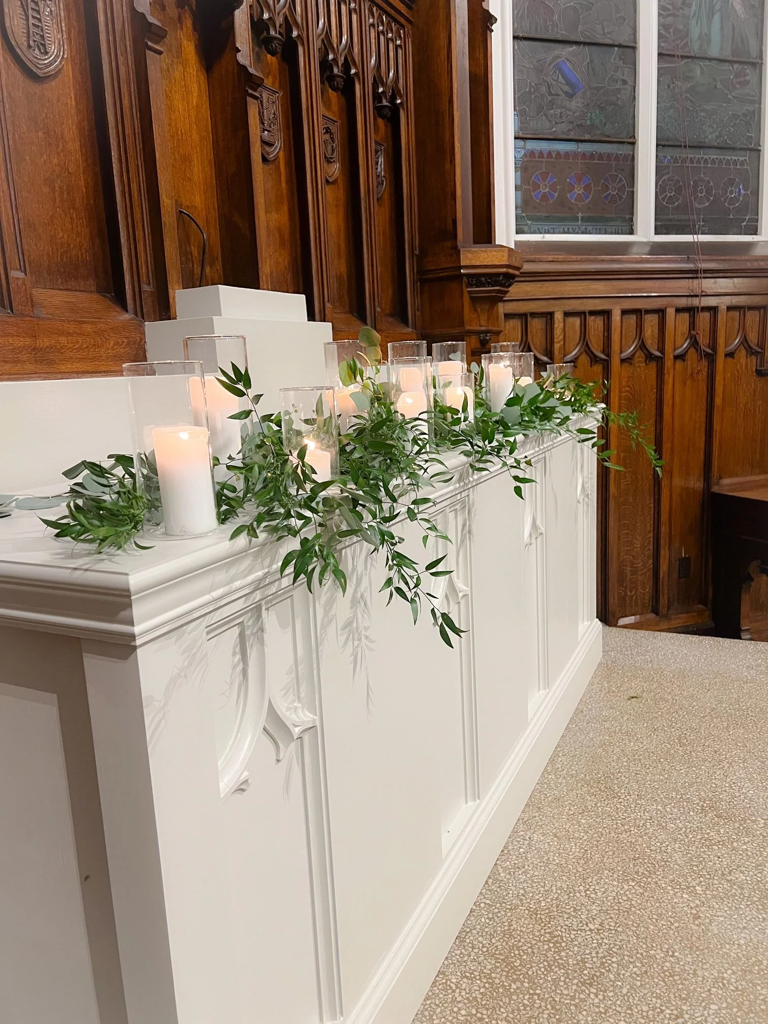 St James greenery candle altar.jpg
