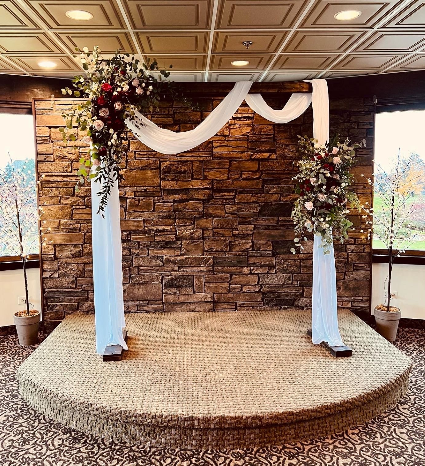 Burgundy blush chiffon arch LED trees.JPG