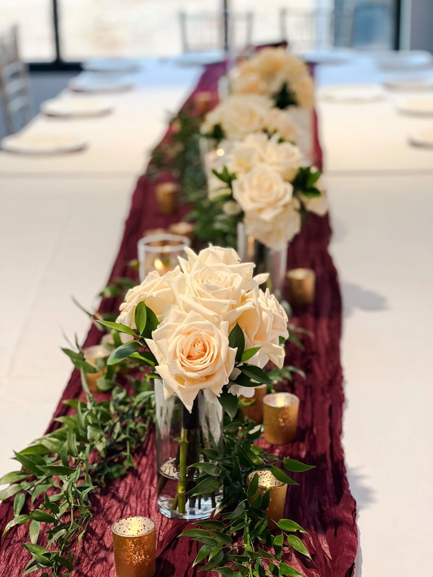 Head table burgundy runner maid bouquets.jpg