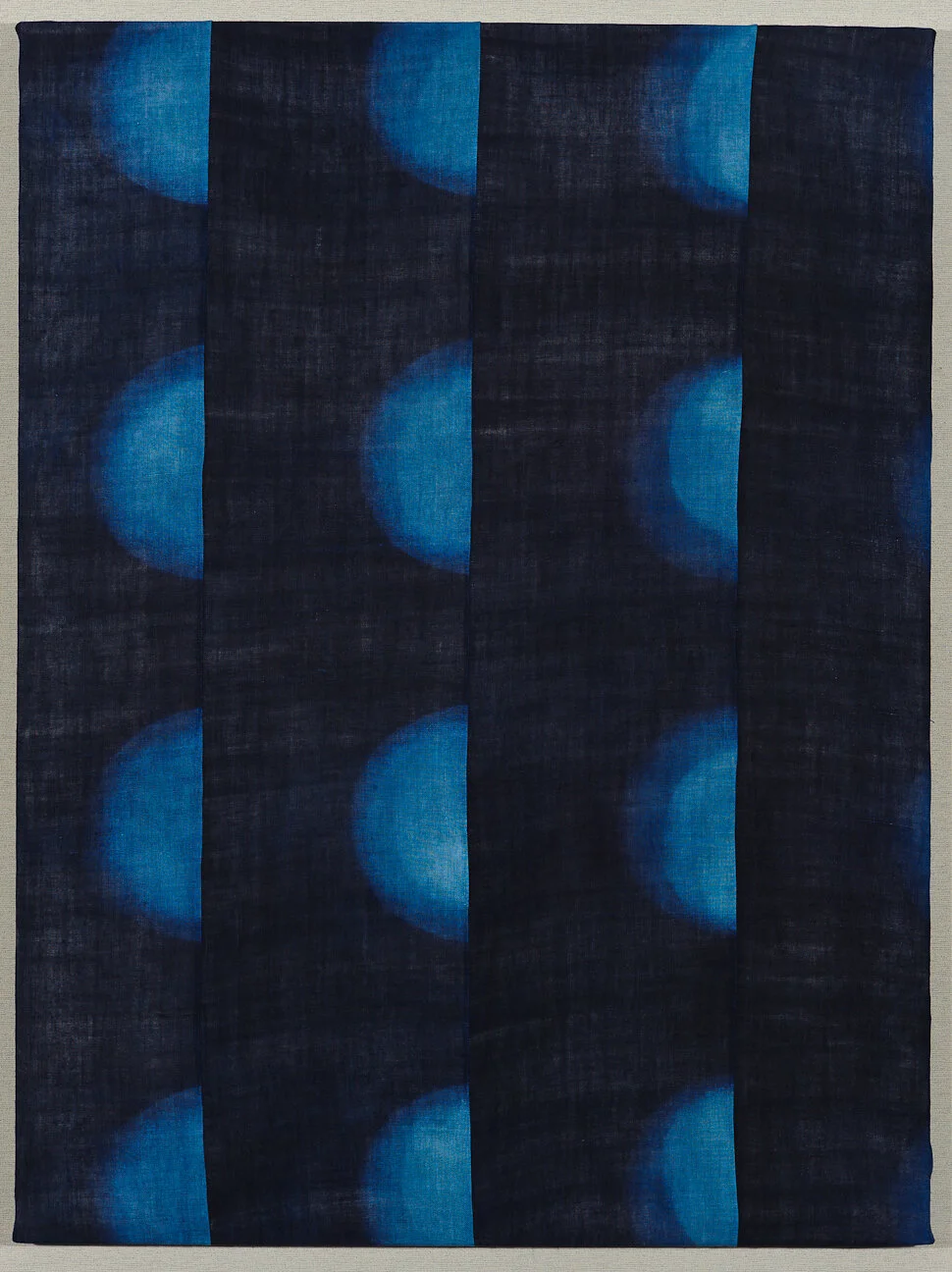Many Moons
Shibori and indigo on handwoven Japanese ramie, machine-sewn, 4' high x 3' wide, 2011
(photo: Scott Kubo)
Click the image to see detail photos