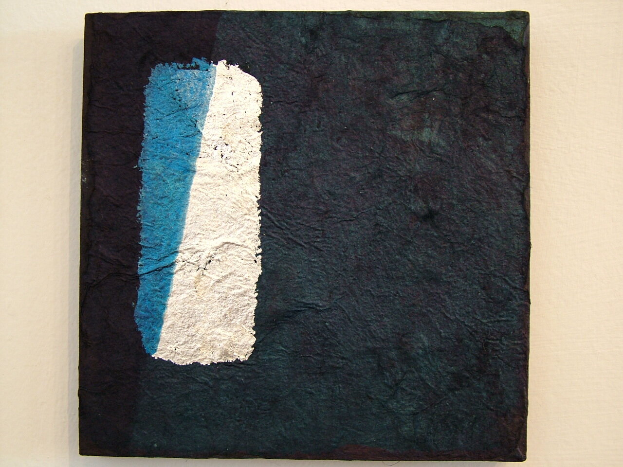 Kozo, silver leaf and indigo on board, 5" high by 5" wide, 2006