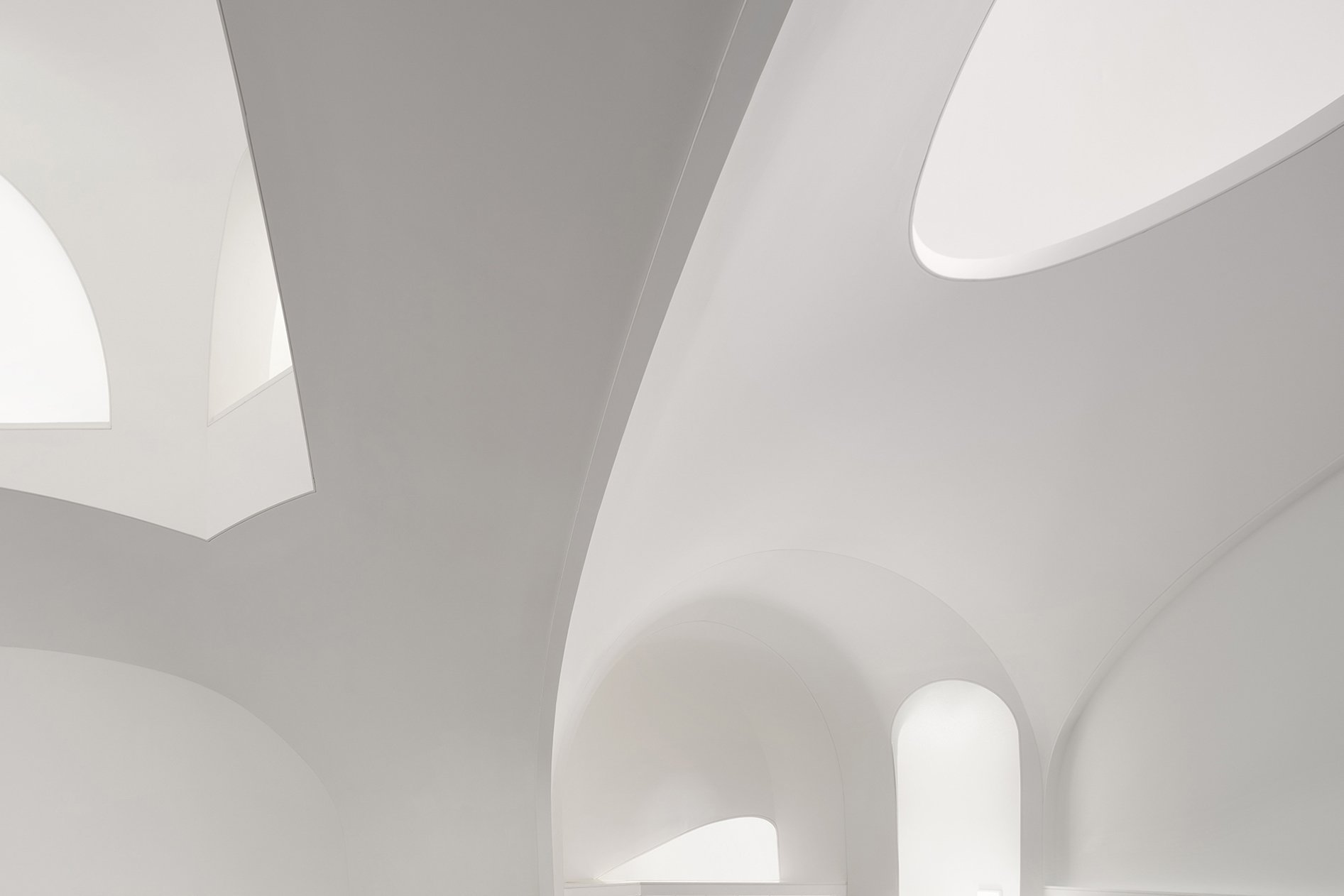 The sanctuary is completely free of visible light sources. All sunlight, daylight, and architectural light is reflected.