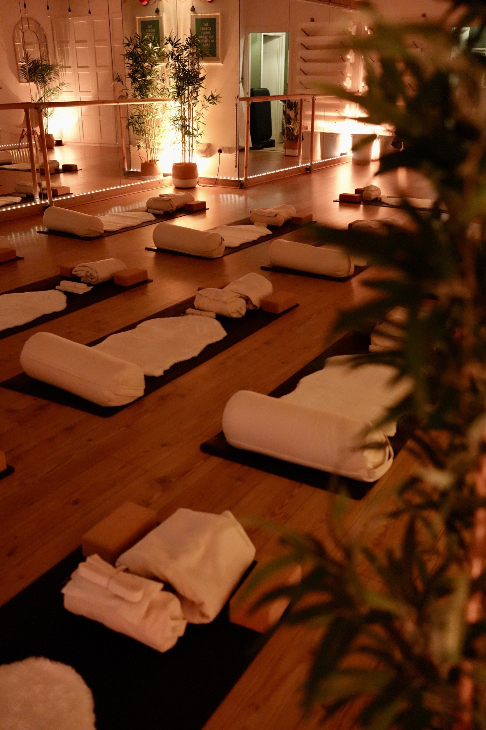 yoga mats & equipment on floor ready for a yoga class flow studio torquay