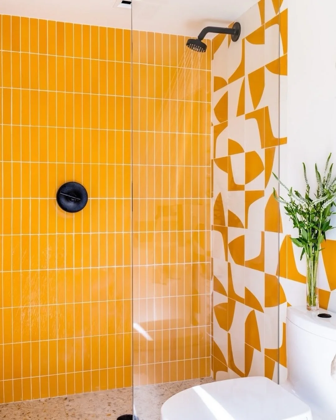 showered in sunshine 🌞🚿 //
⠀⠀⠀⠀⠀⠀⠀⠀⠀
〰️ @radoniinteriors used our StRaNdS @dwellmagazine mixed tails in colors acacia + ivory 💛
⠀⠀⠀⠀⠀⠀⠀⠀⠀
〰️ the perfect patterned bathroom tile - safe for wet areas, ultra durable, and low maintenance! 🙌