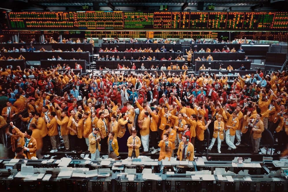 Selected photos from Andreas Gursky&rsquo;s &lsquo;Stock Exchanges&rsquo; series. 
In addition to using an elevated vantage point as a main perspective that allows the audience to view the scenes from both a peripheral and central viewpoint, &lsquo;S
