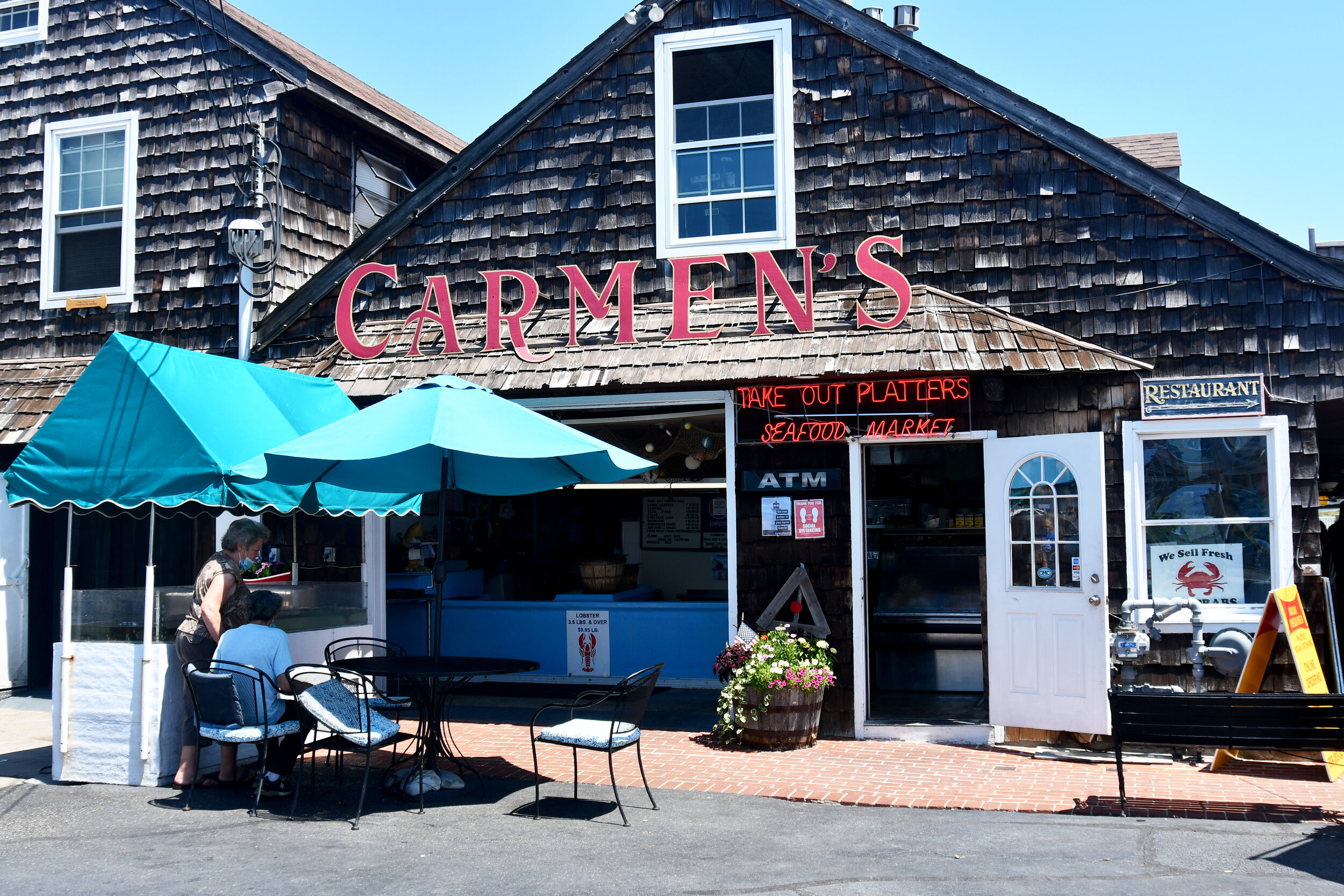 Carmen’s Seafood Market is in the front of the property for takeout and the restaurant in the back overlooks the bay.