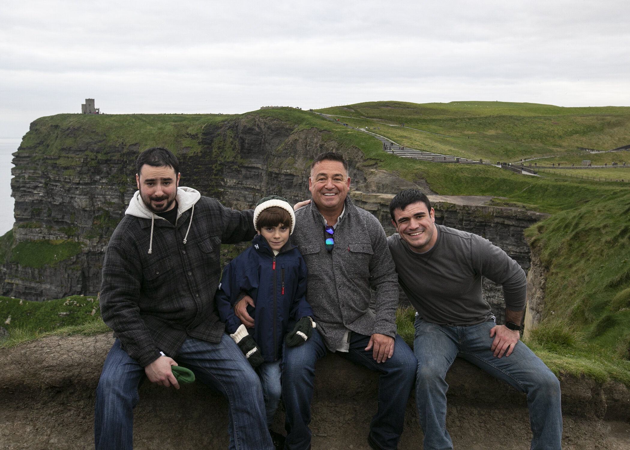 … and with his father, Jimmy, and brothers, Luke and Anthony.